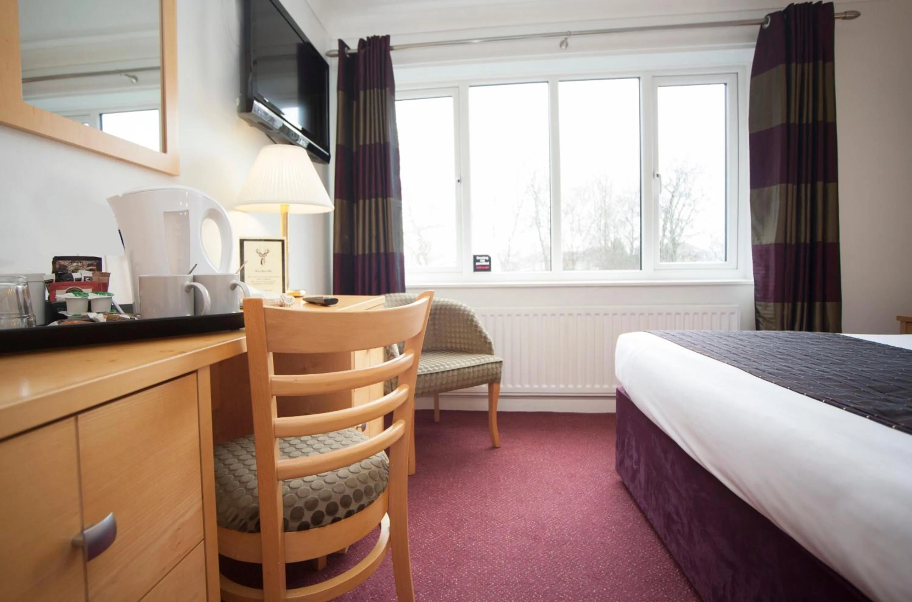 Bedroom in The Victoria Hotel Manchester by Compass Hospitality