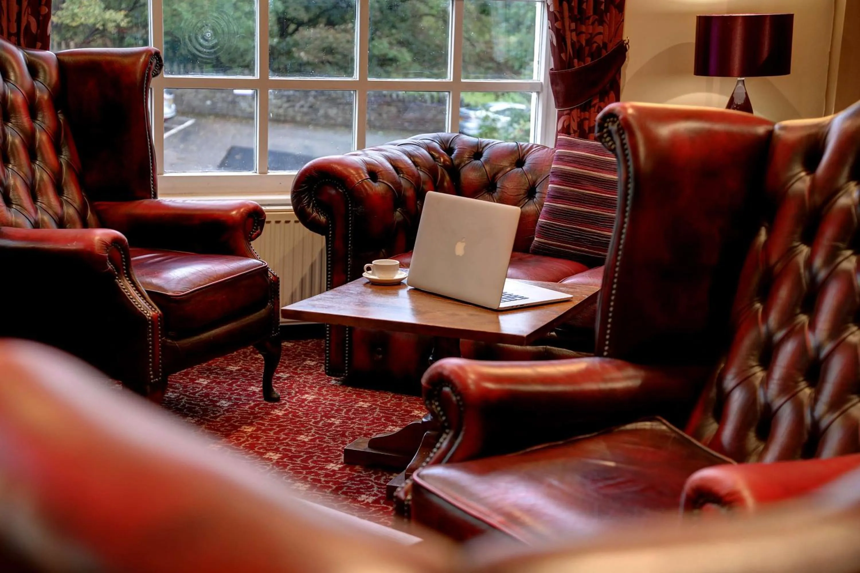 Communal lounge/ TV room in Bury Ramsbottom Old Mill Hotel and Leisure Club