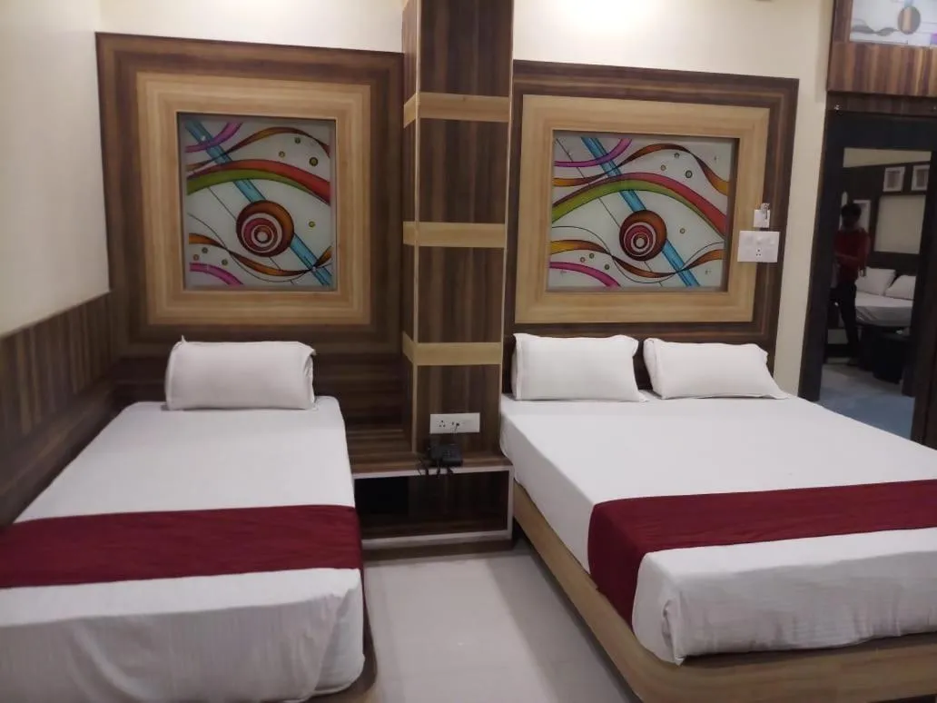 Bed in HOTEL R K RESIDENCY MUZAFFARPUR