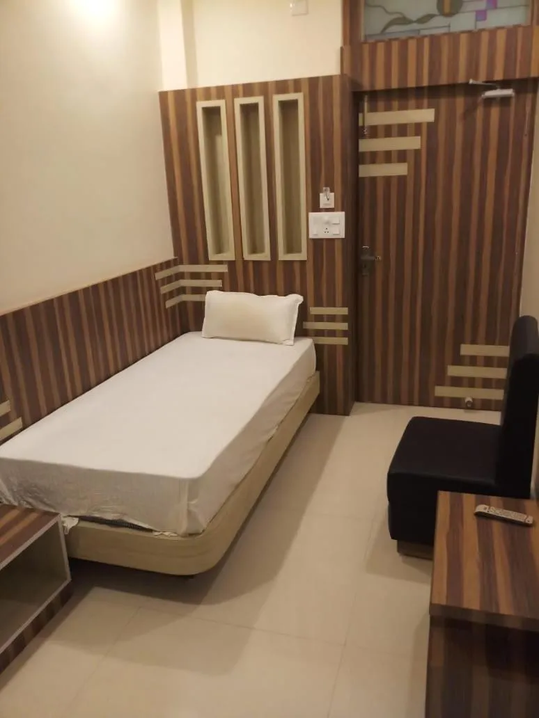 Bed in HOTEL R K RESIDENCY MUZAFFARPUR