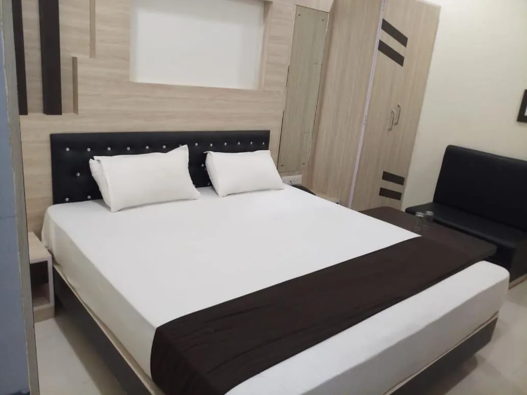 Bed in HOTEL R K RESIDENCY MUZAFFARPUR