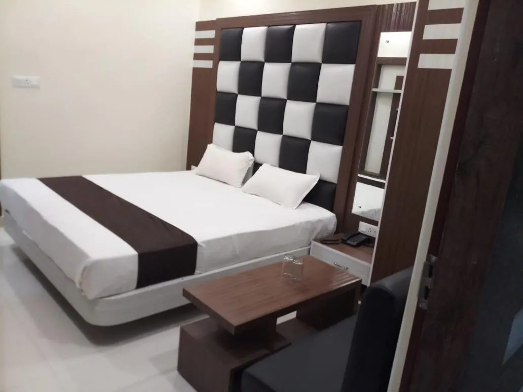Bed in HOTEL R K RESIDENCY MUZAFFARPUR