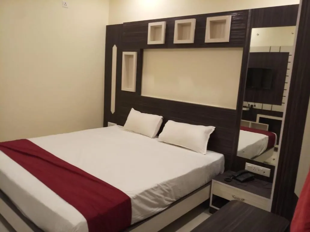 Bed in HOTEL R K RESIDENCY MUZAFFARPUR