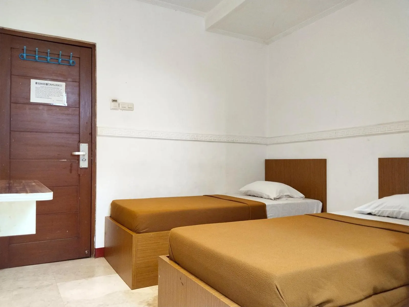 Bed in Wisma Juanda Powered by Cocotel