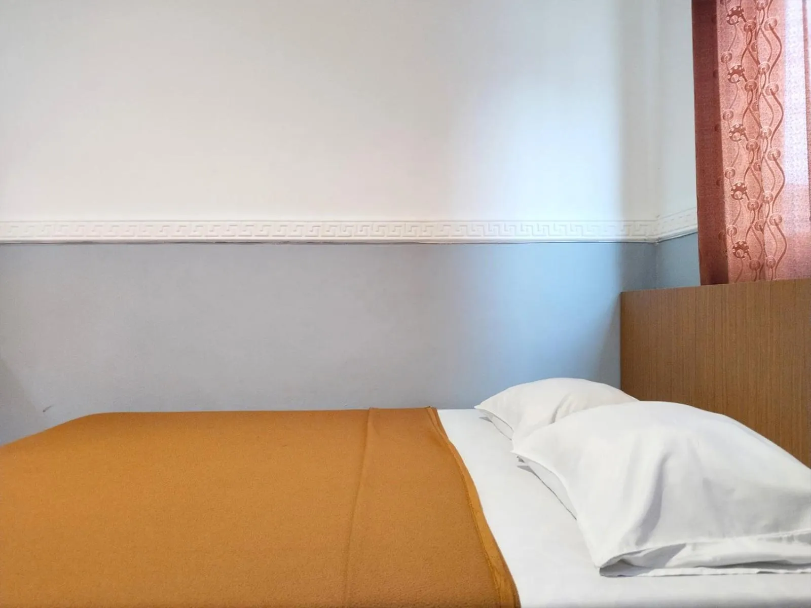 Bed in Wisma Juanda Powered by Cocotel