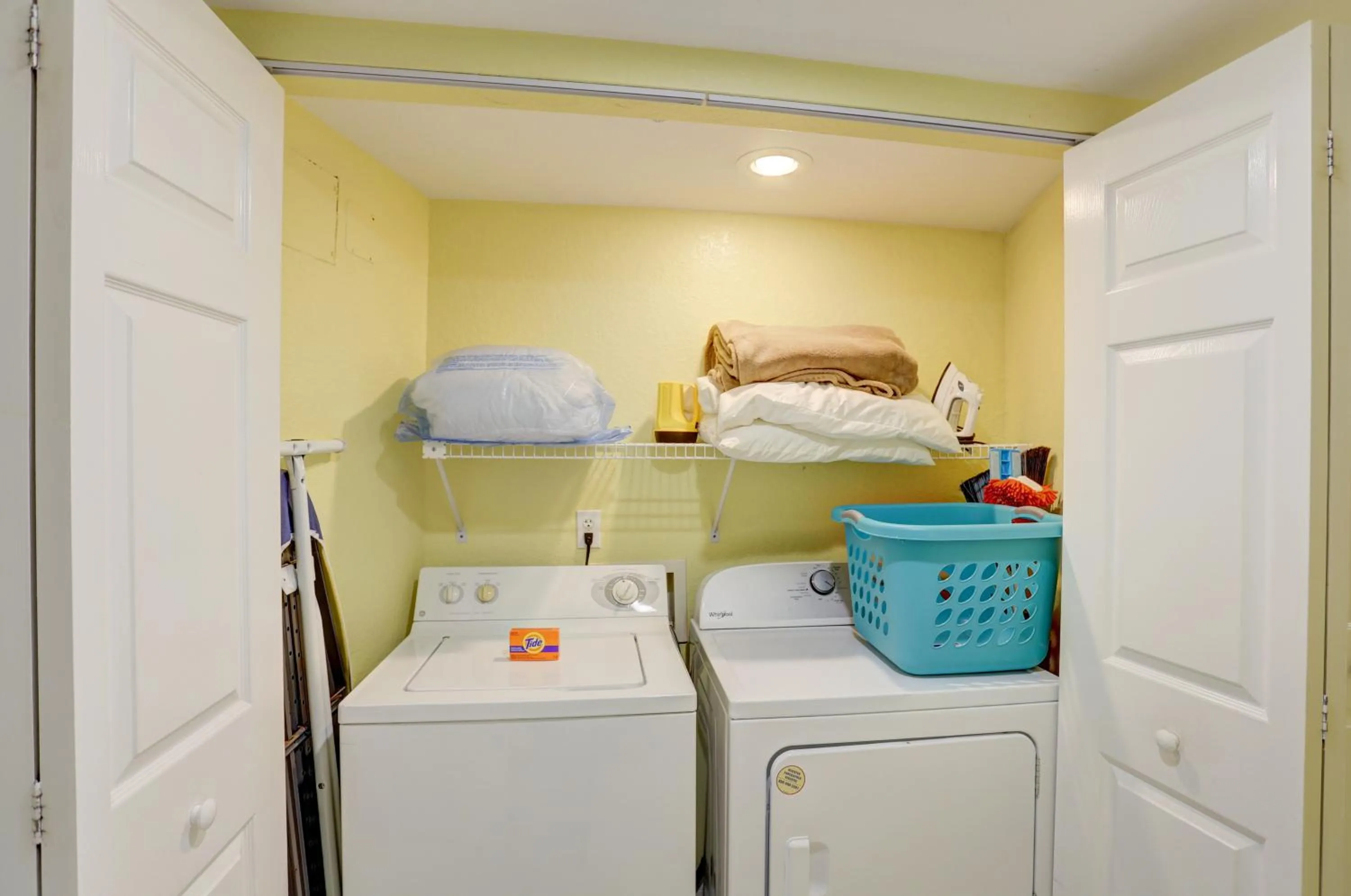 Bed in South Beach Condo Hotel by Travel Resort Services, Inc.