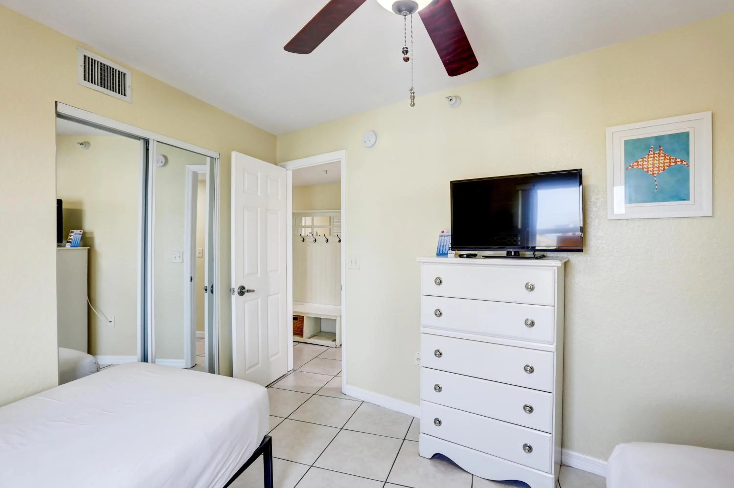 Bed in South Beach Condo Hotel by Travel Resort Services, Inc.