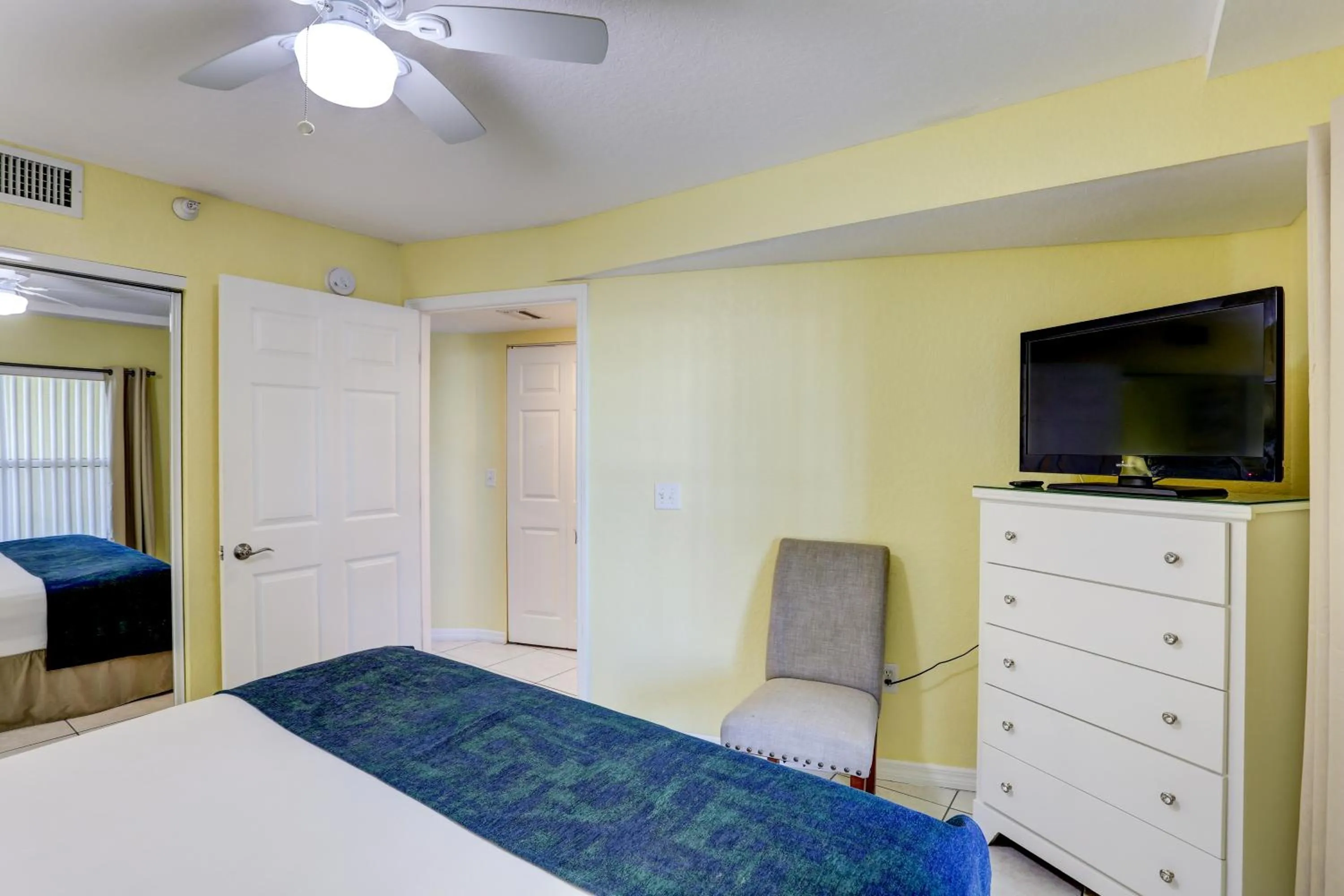 Bed in South Beach Condo Hotel by Travel Resort Services, Inc.