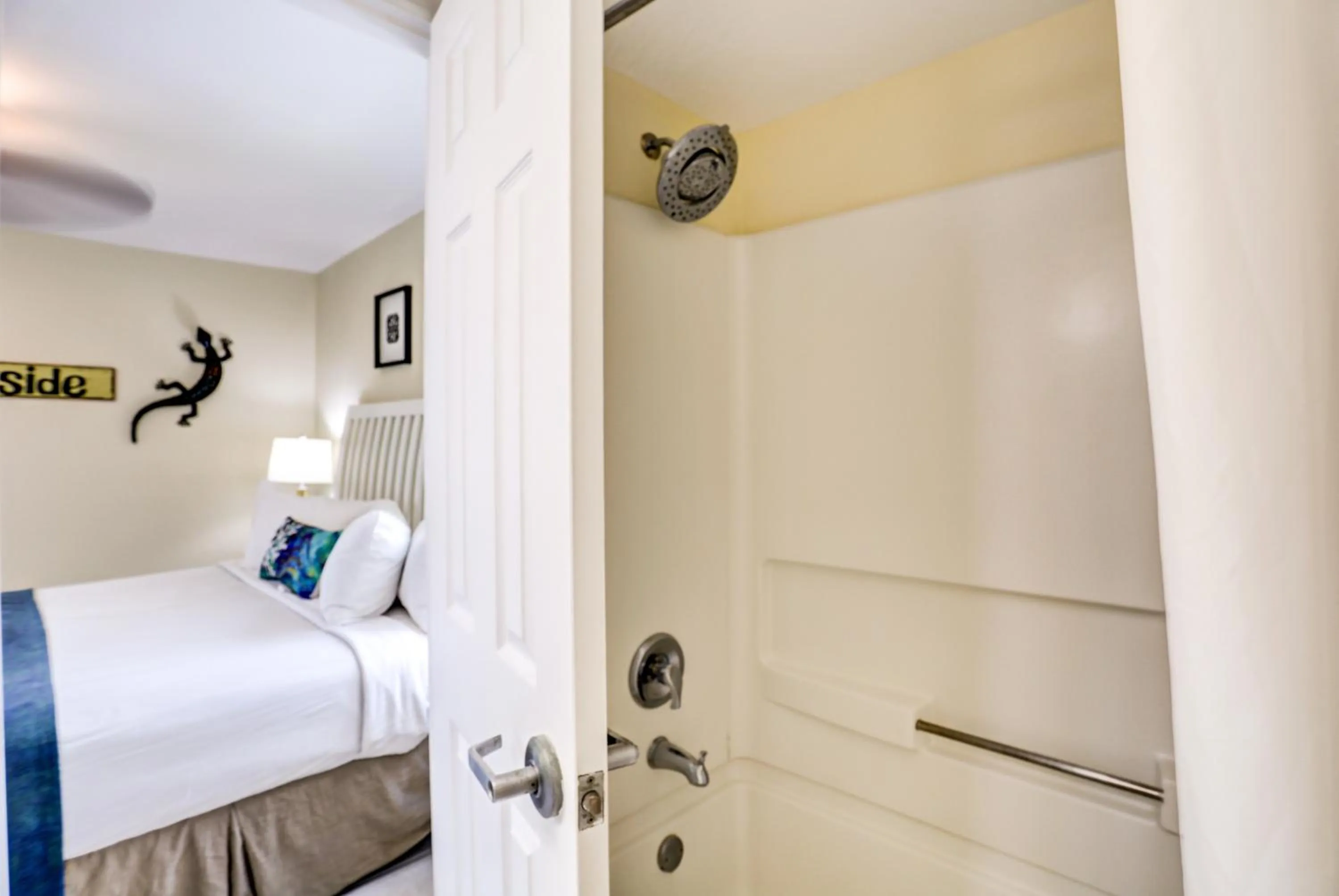 Bed in South Beach Condo Hotel by Travel Resort Services, Inc.