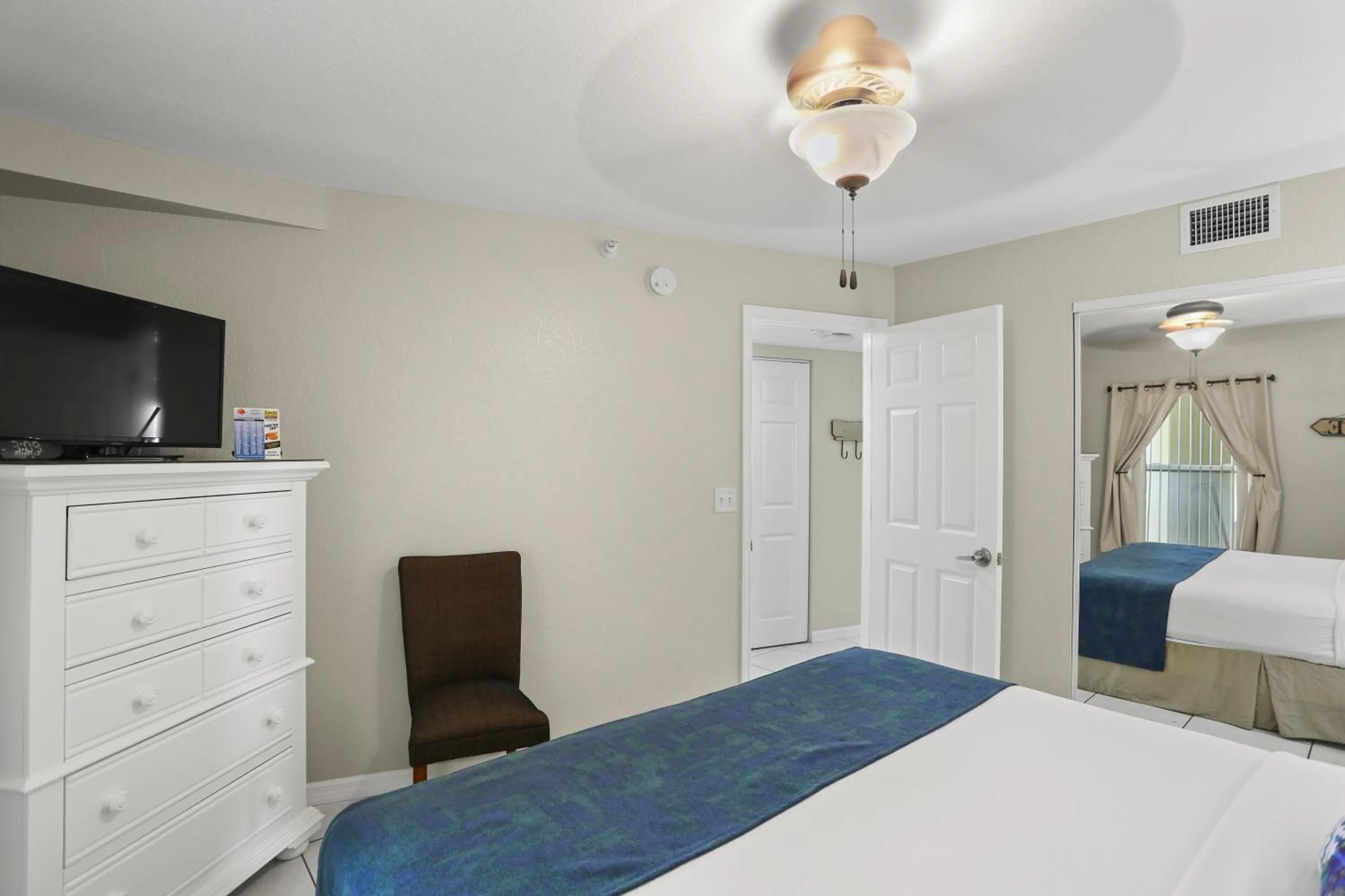 Bed in South Beach Condo Hotel by Travel Resort Services, Inc.