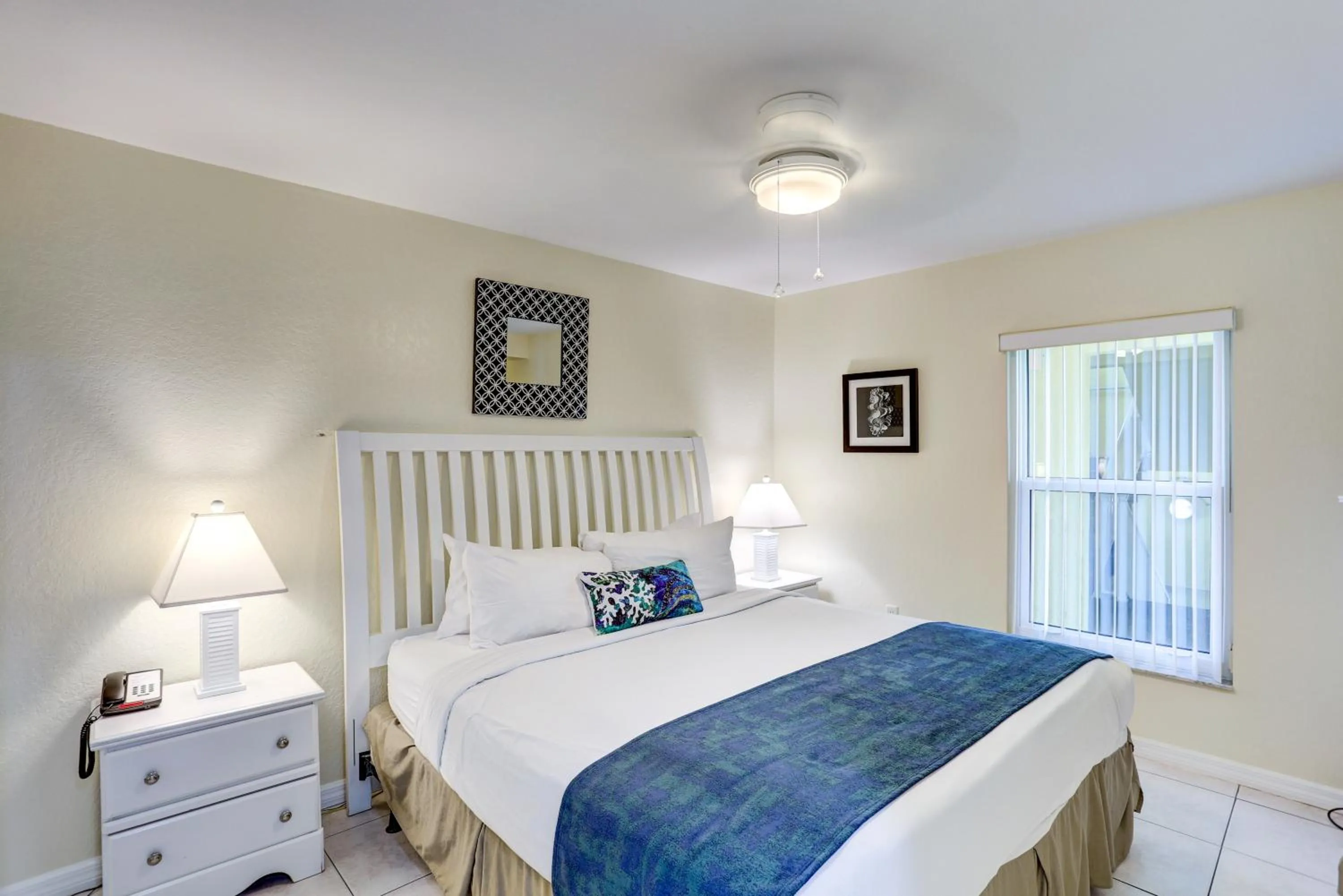 Bed in South Beach Condo Hotel by Travel Resort Services, Inc.