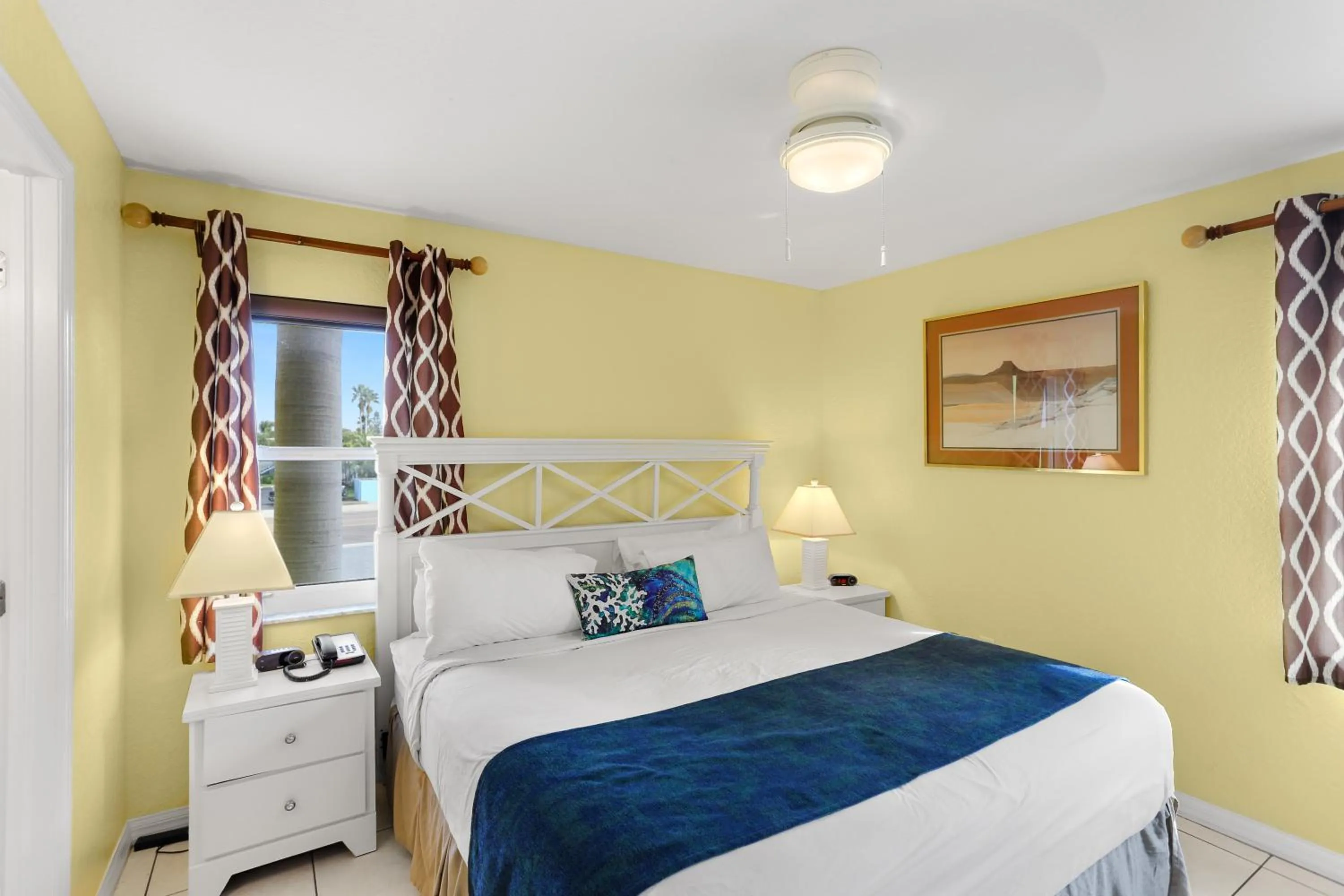 Bed in South Beach Condo Hotel by Travel Resort Services, Inc.