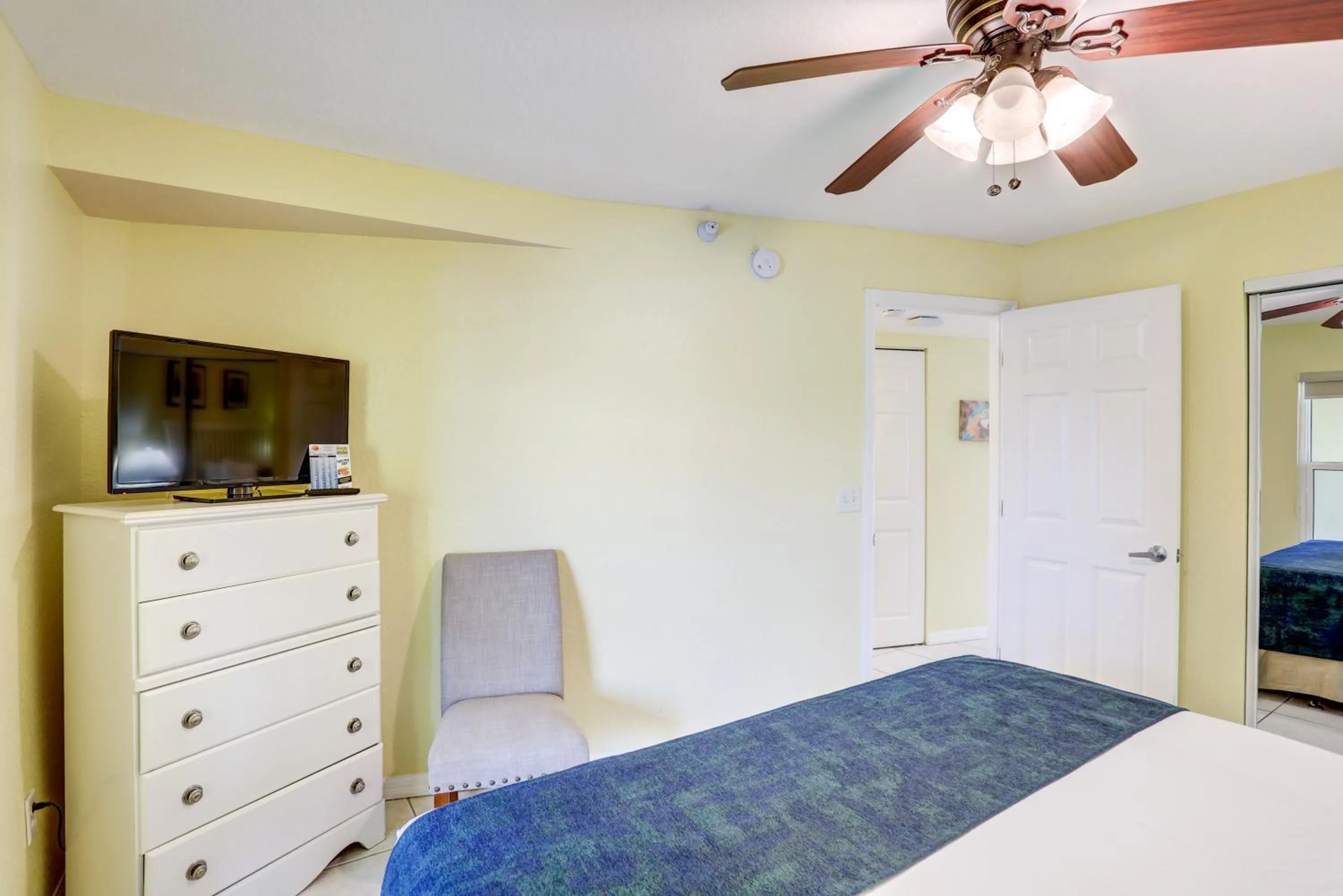 Bed in South Beach Condo Hotel by Travel Resort Services, Inc.