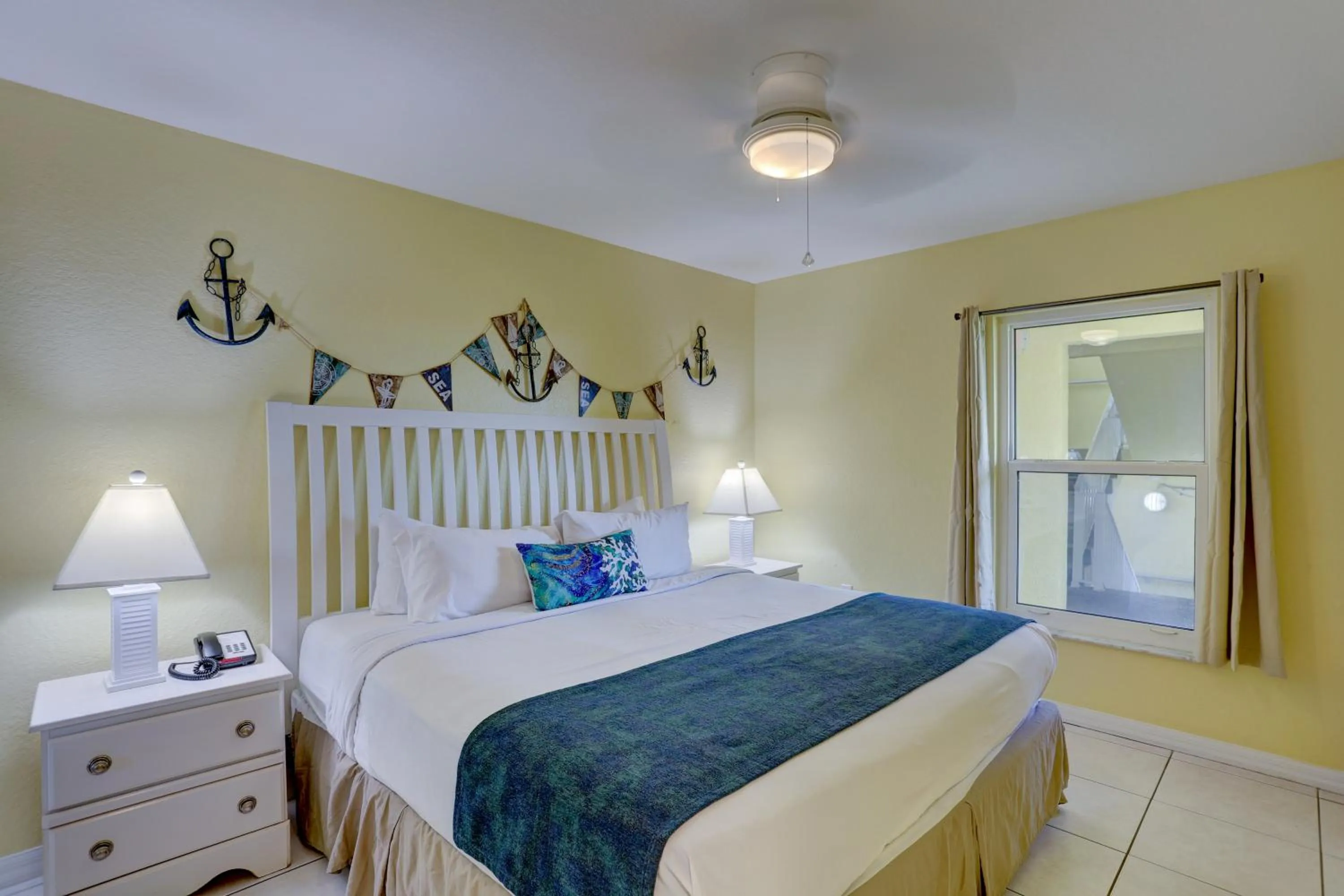 Bed in South Beach Condo Hotel by Travel Resort Services, Inc.