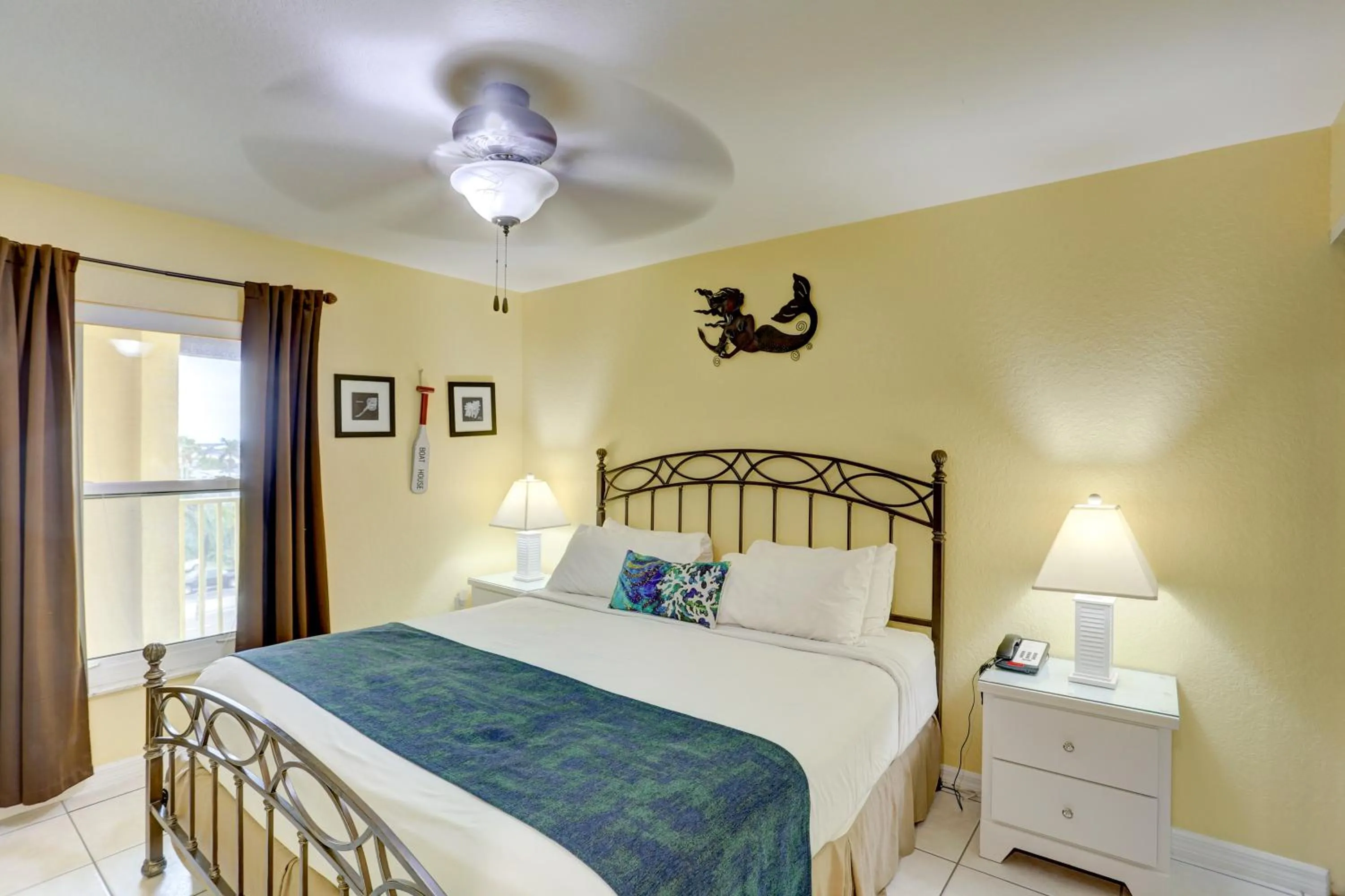 Bed in South Beach Condo Hotel by Travel Resort Services, Inc.