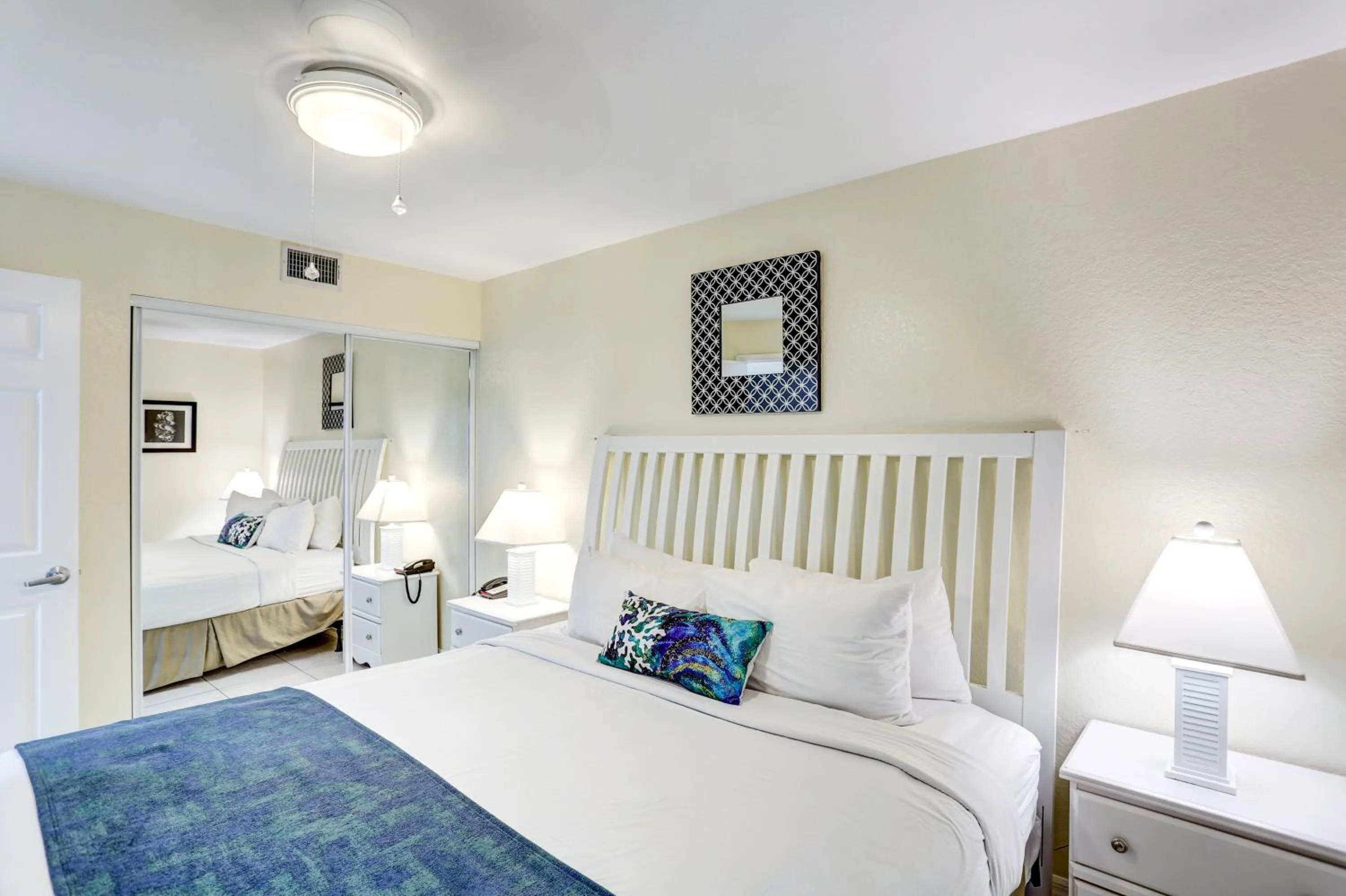 Bed in South Beach Condo Hotel by Travel Resort Services, Inc.