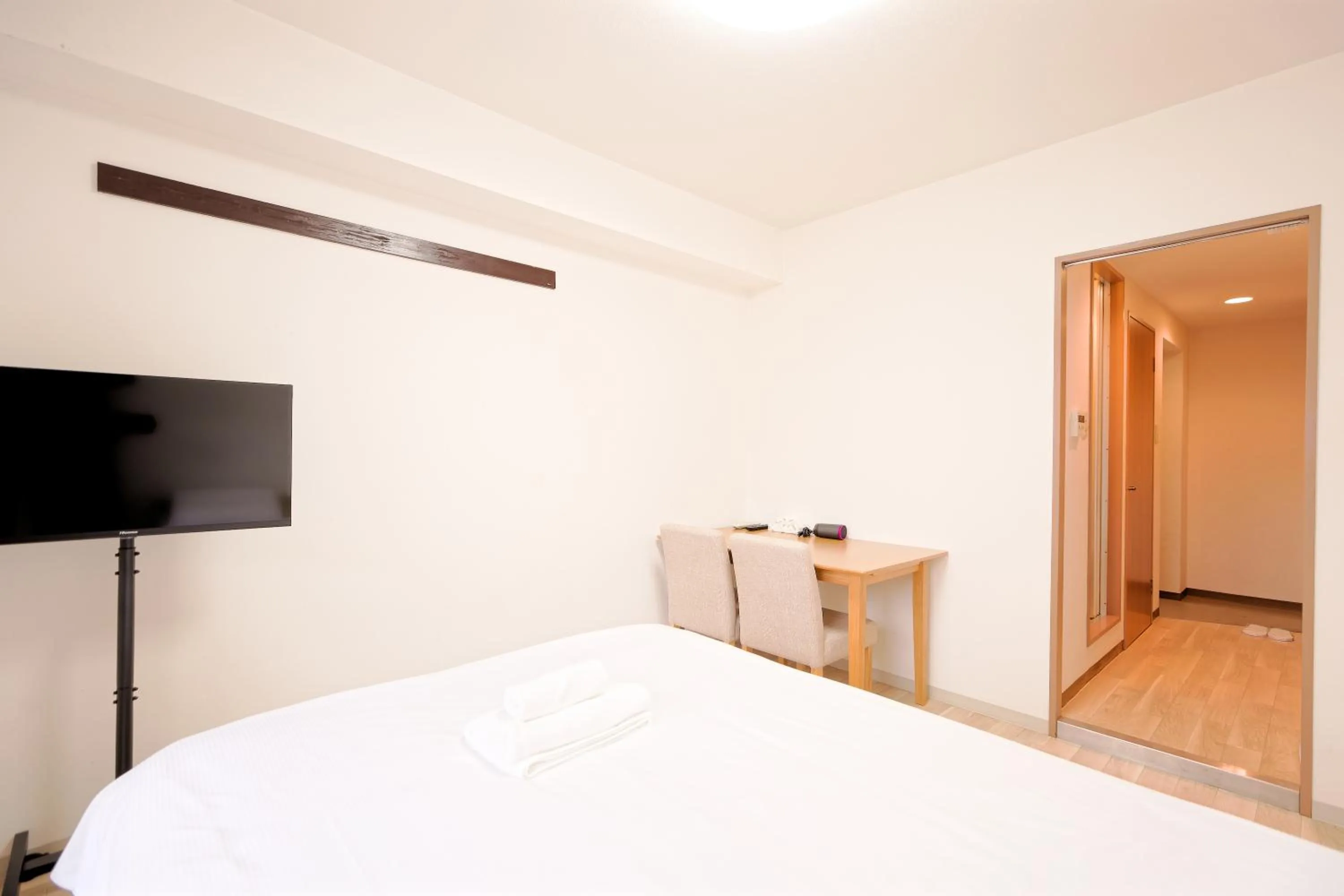 Bed in Shinjuku Waseda Earthtone Apartment