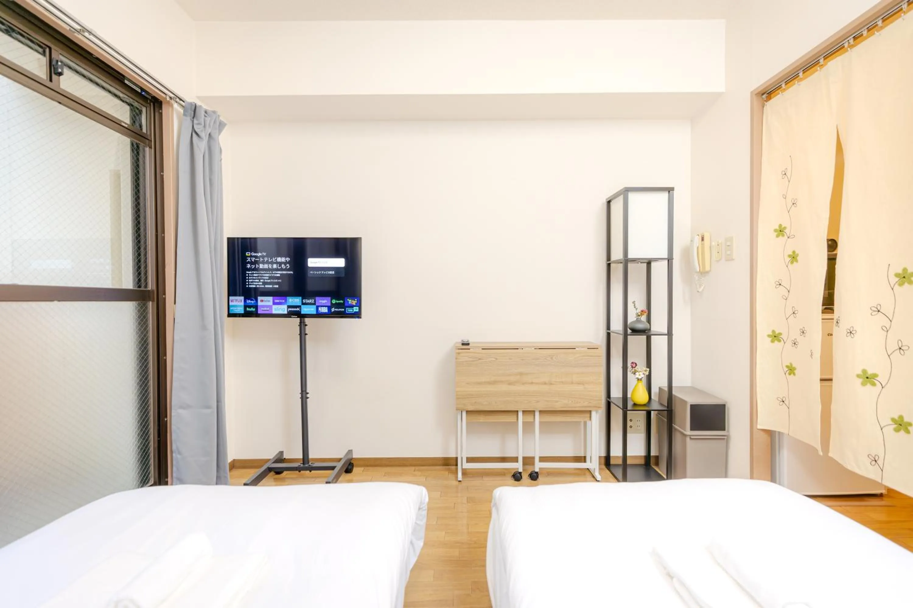 Bed in Shinjuku Waseda Earthtone Apartment