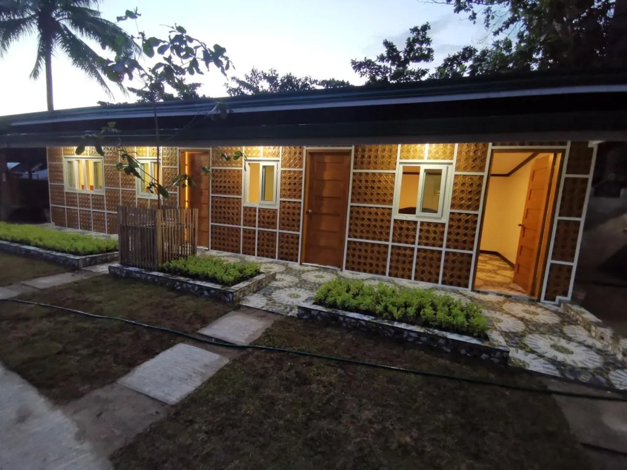 Property building in Tambayan Rooms and Cottages by SMS Hospitality
