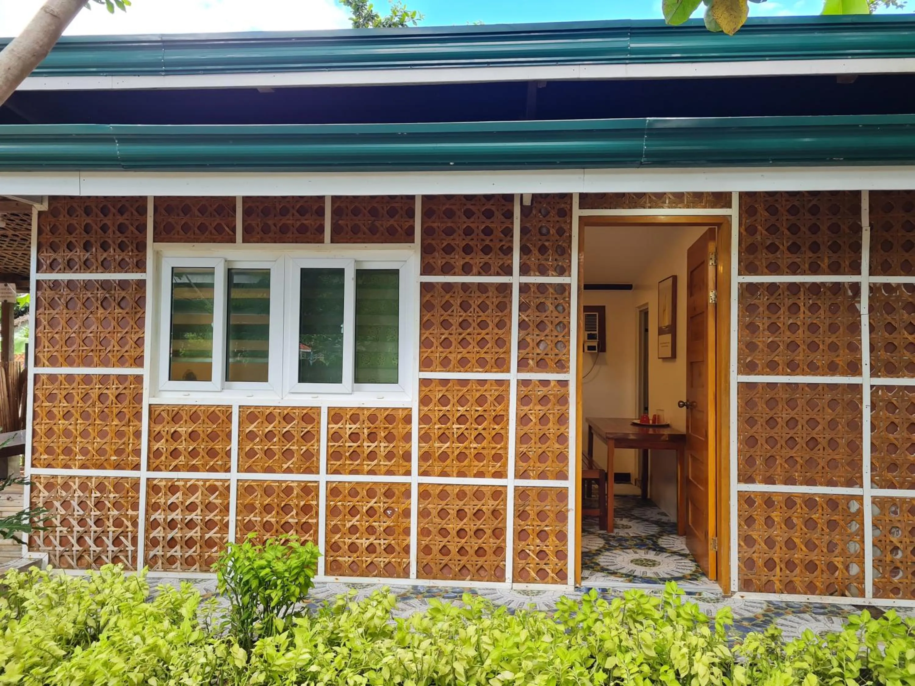 Property building in Tambayan Rooms and Cottages by SMS Hospitality