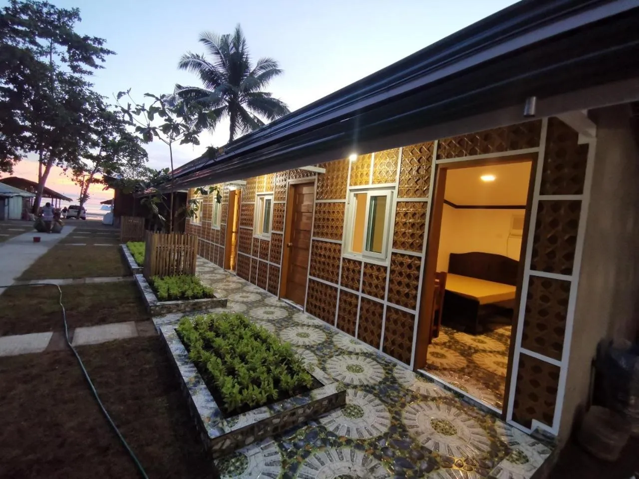 Property building in Tambayan Rooms and Cottages by SMS Hospitality