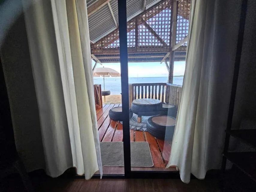Balcony/Terrace in Tambayan Rooms and Cottages by SMS Hospitality