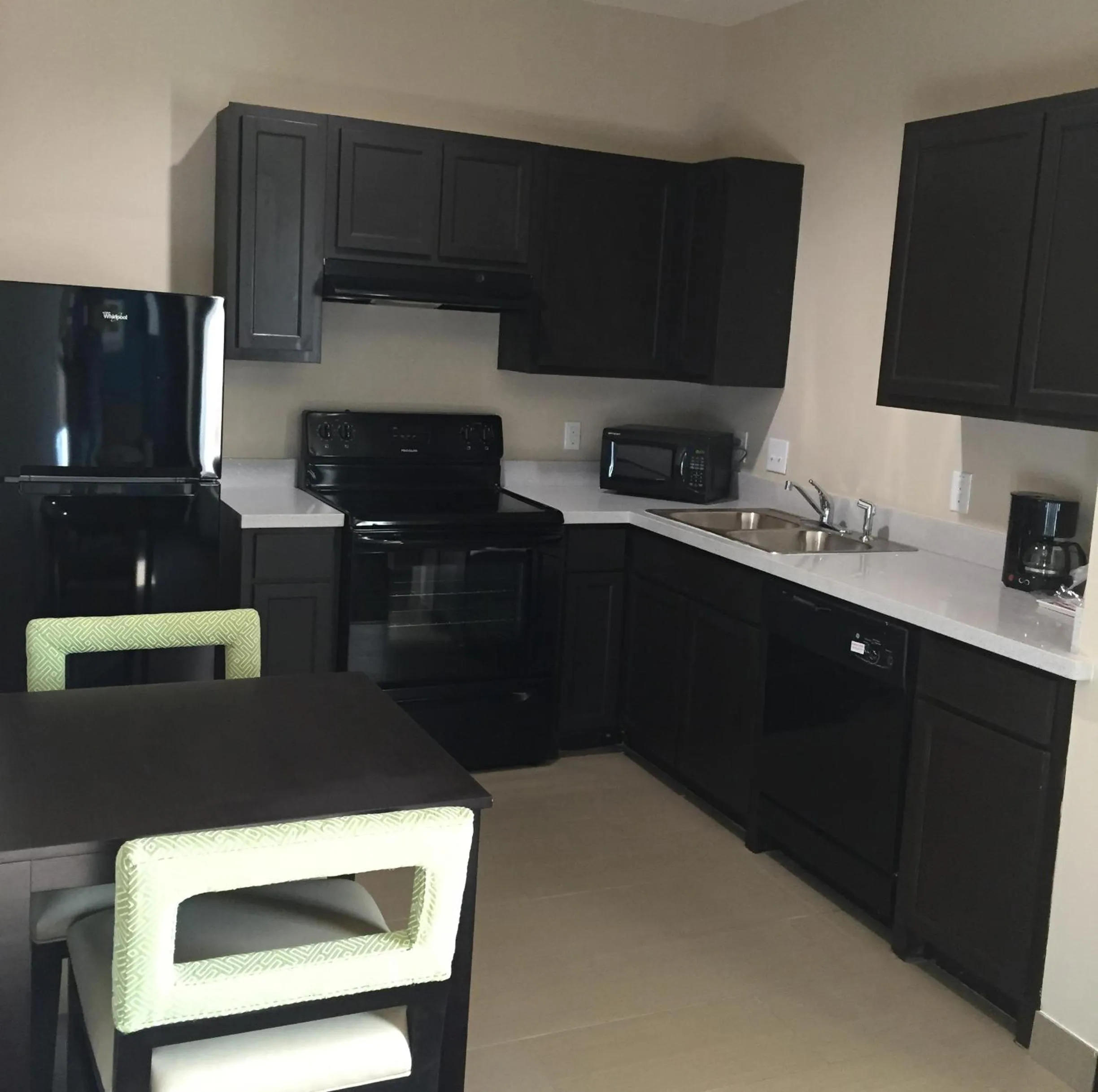 Kitchen or kitchenette in Residency Suites