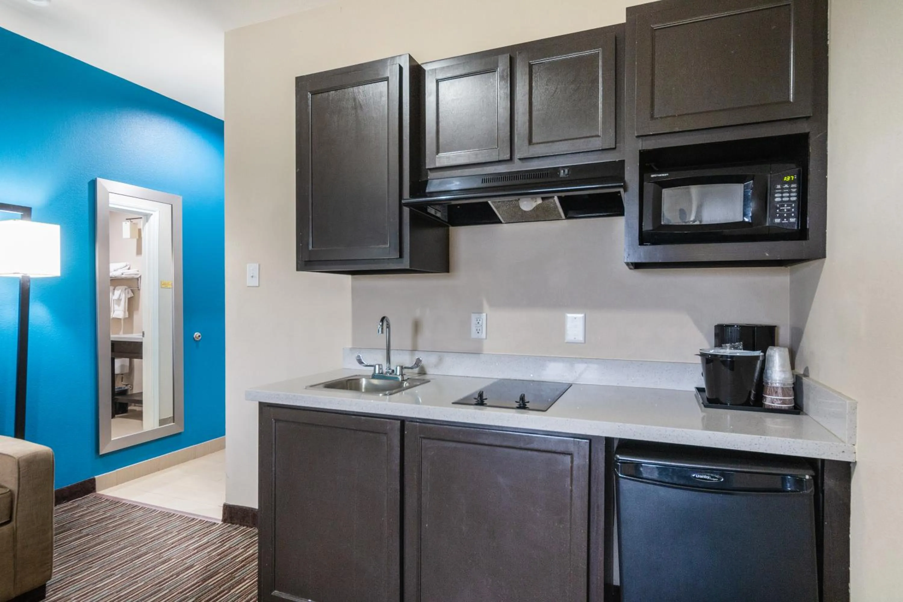 Kitchen or kitchenette in Residency Suites