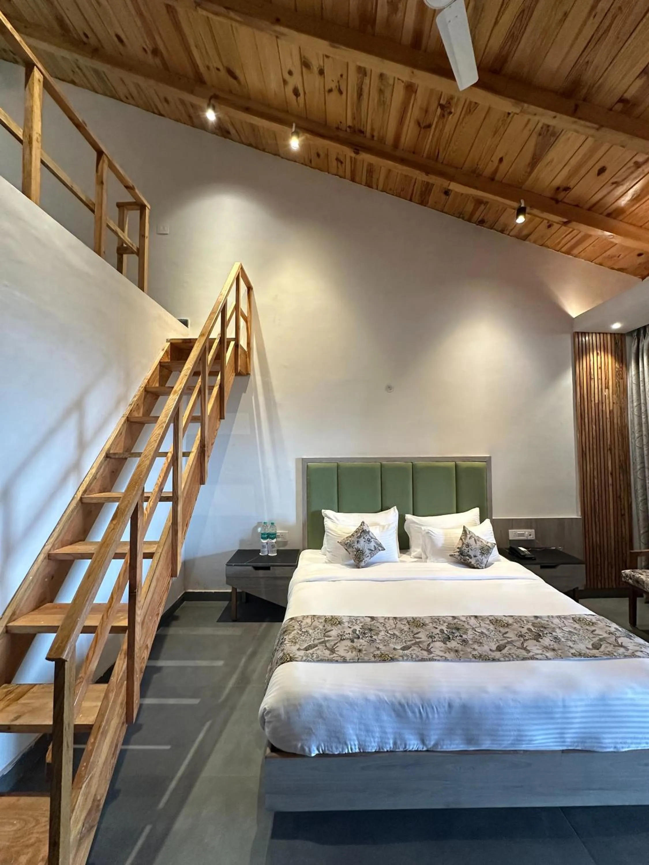 Bed in Evara Spa & Resort