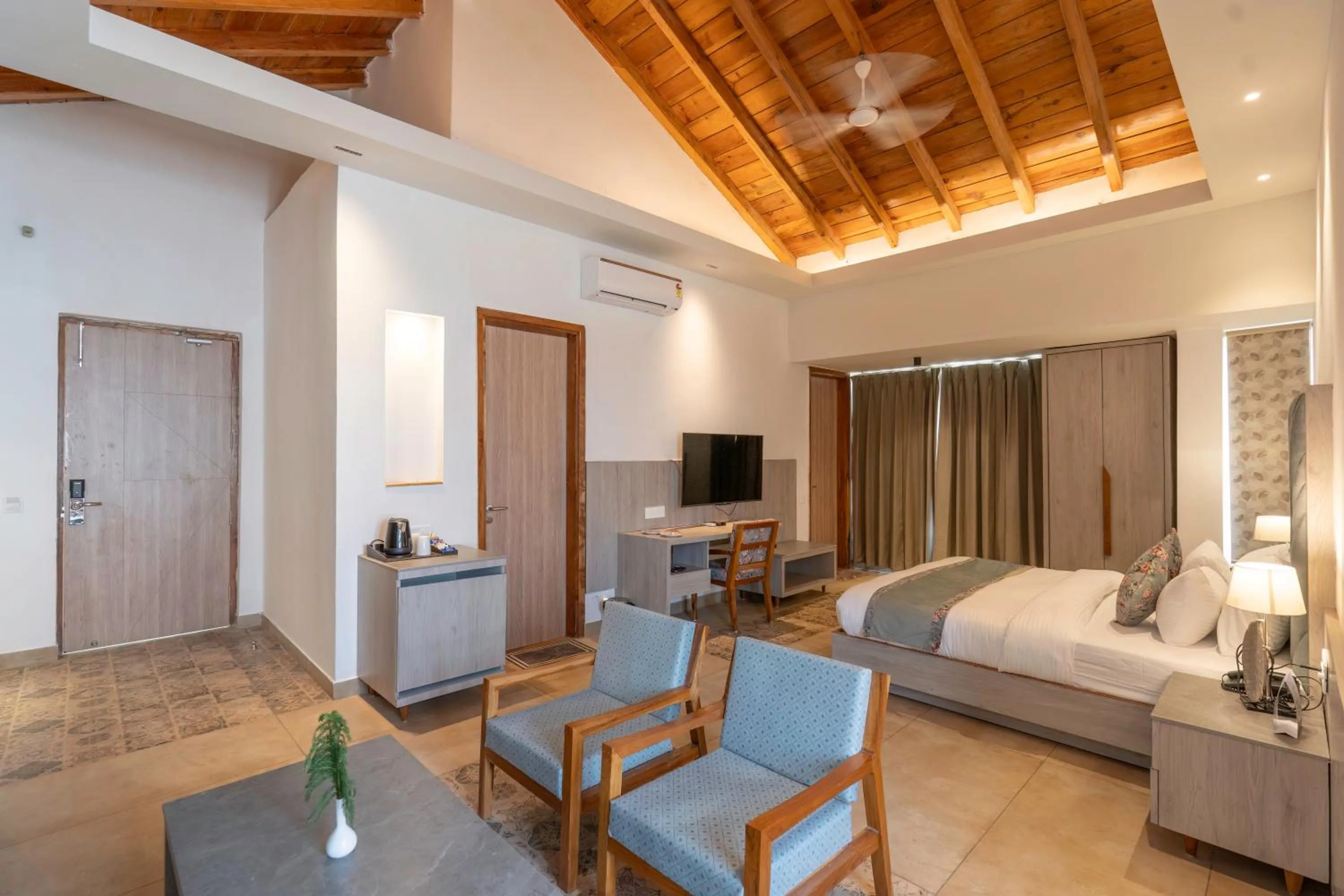 Bed in Evara Spa & Resort