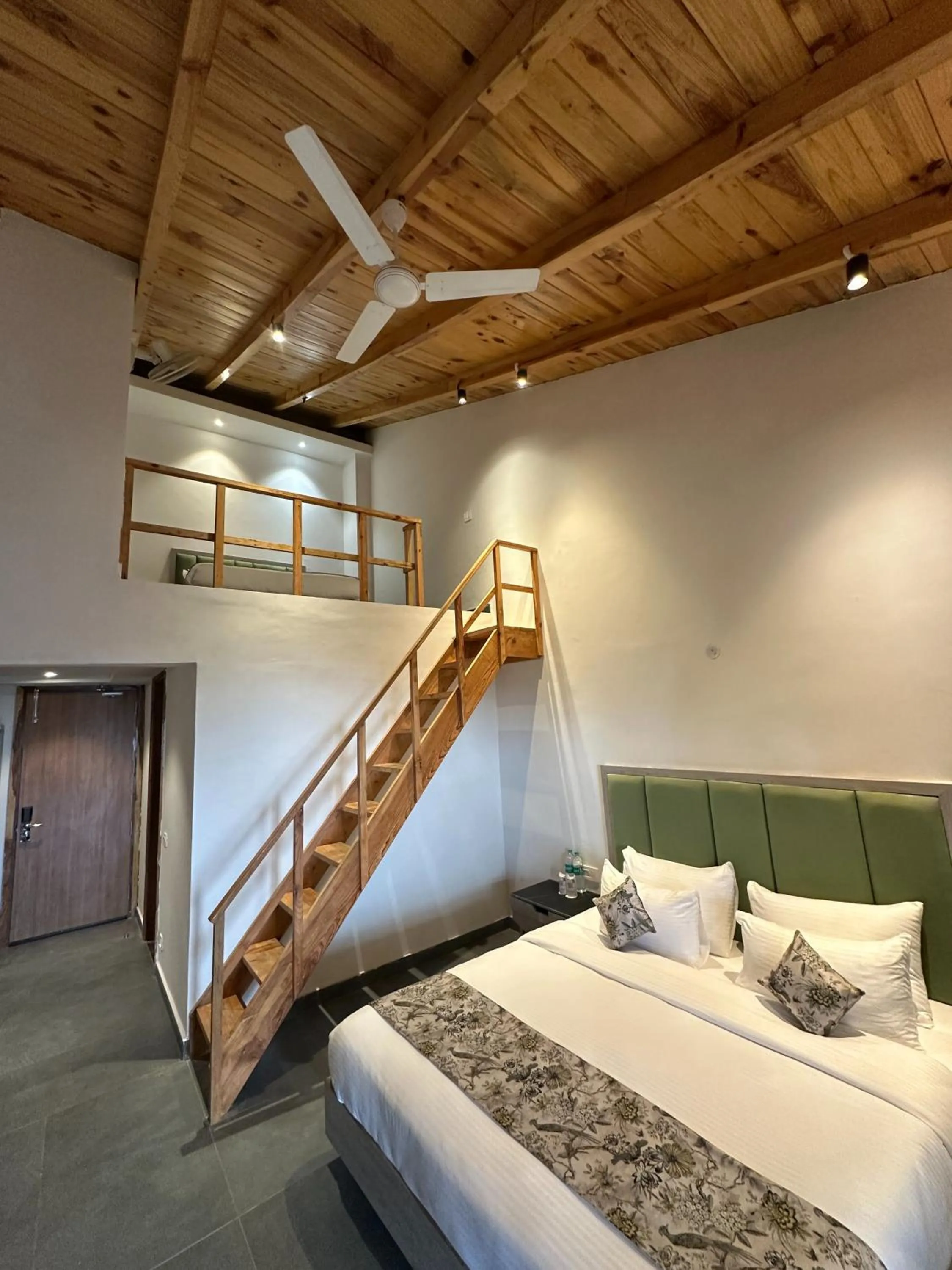 Bed in Evara Spa & Resort