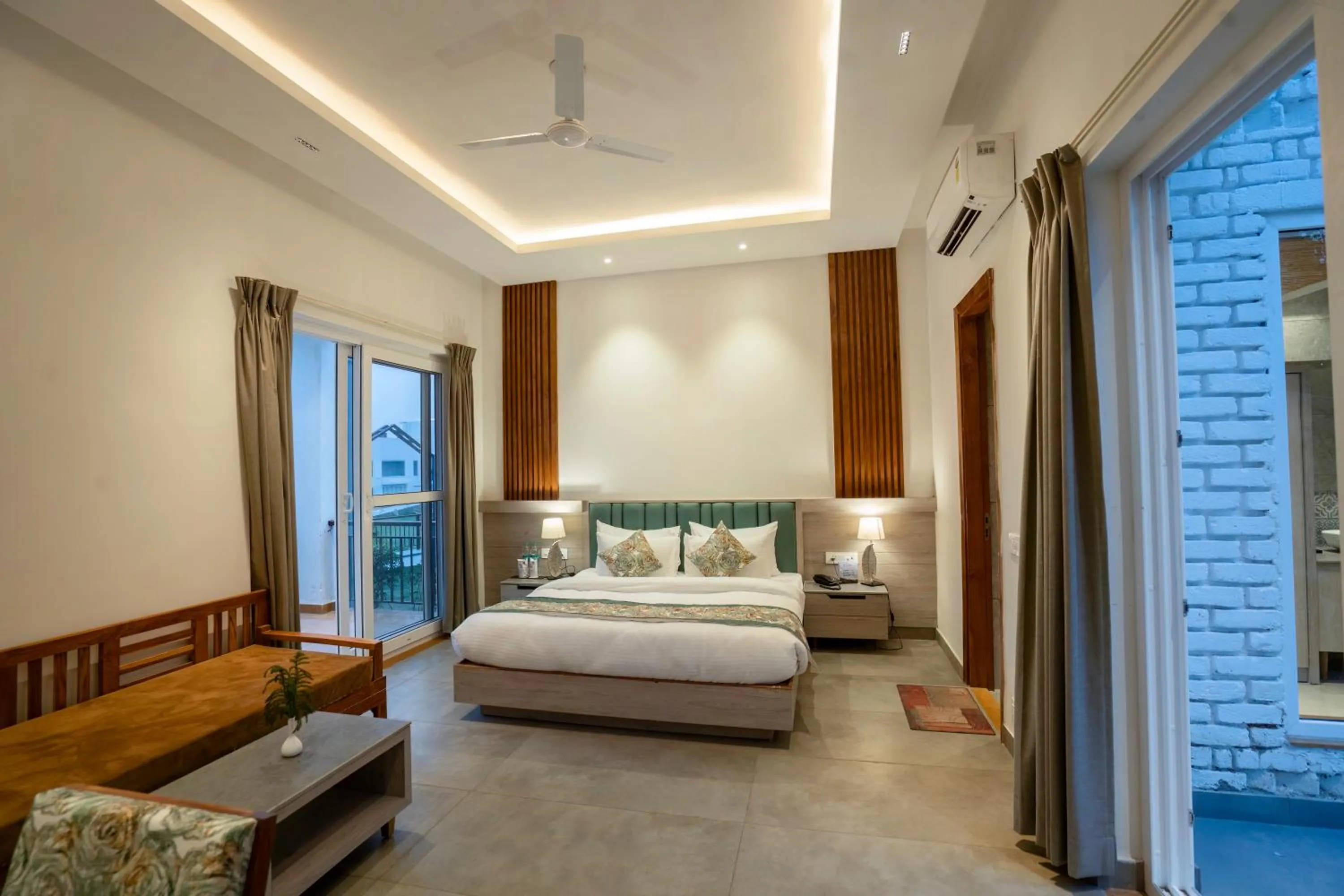 Bed in Evara Spa & Resort