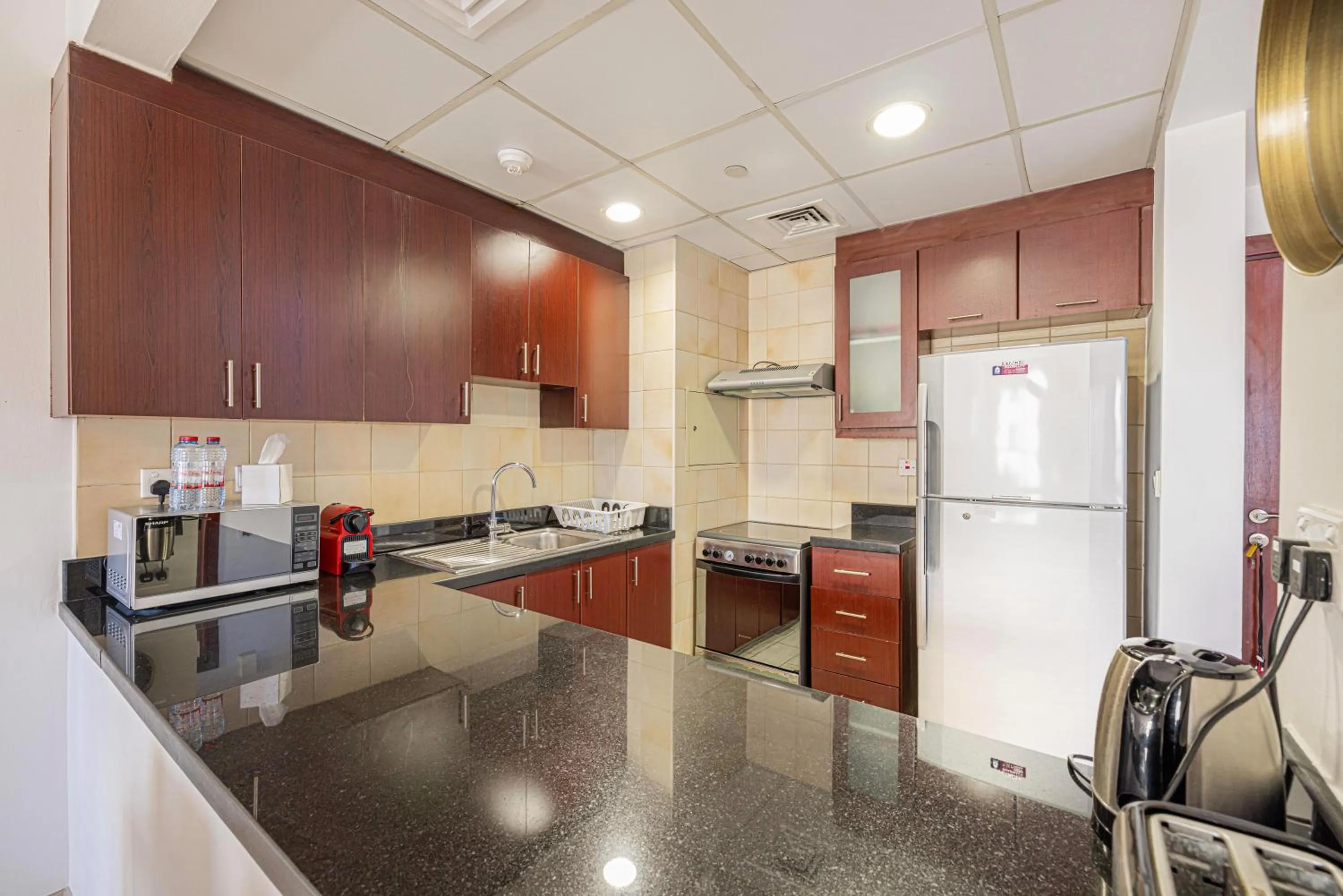 Kitchen or kitchenette in Sound of the Waves in JBR by Lagom