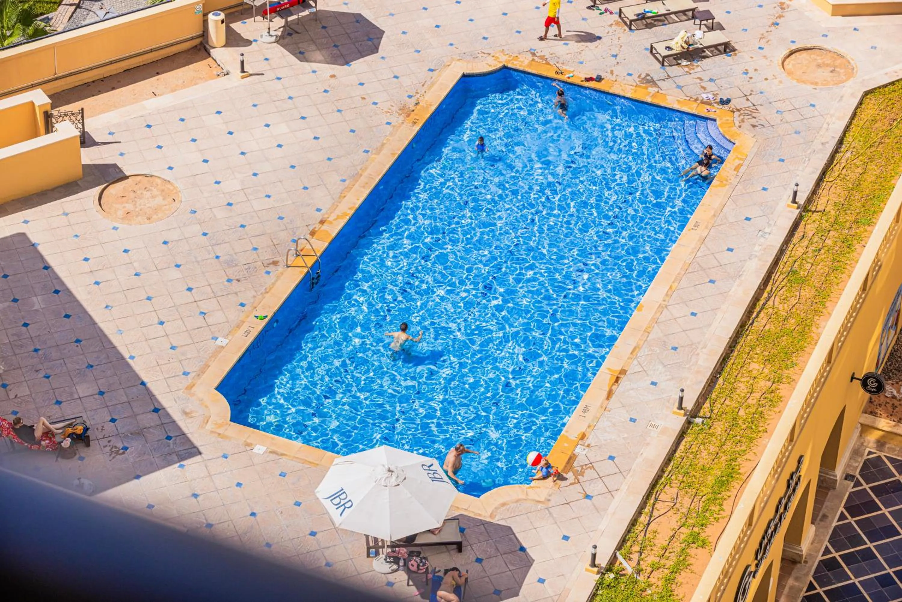 Swimming pool in Sound of the Waves in JBR by Lagom