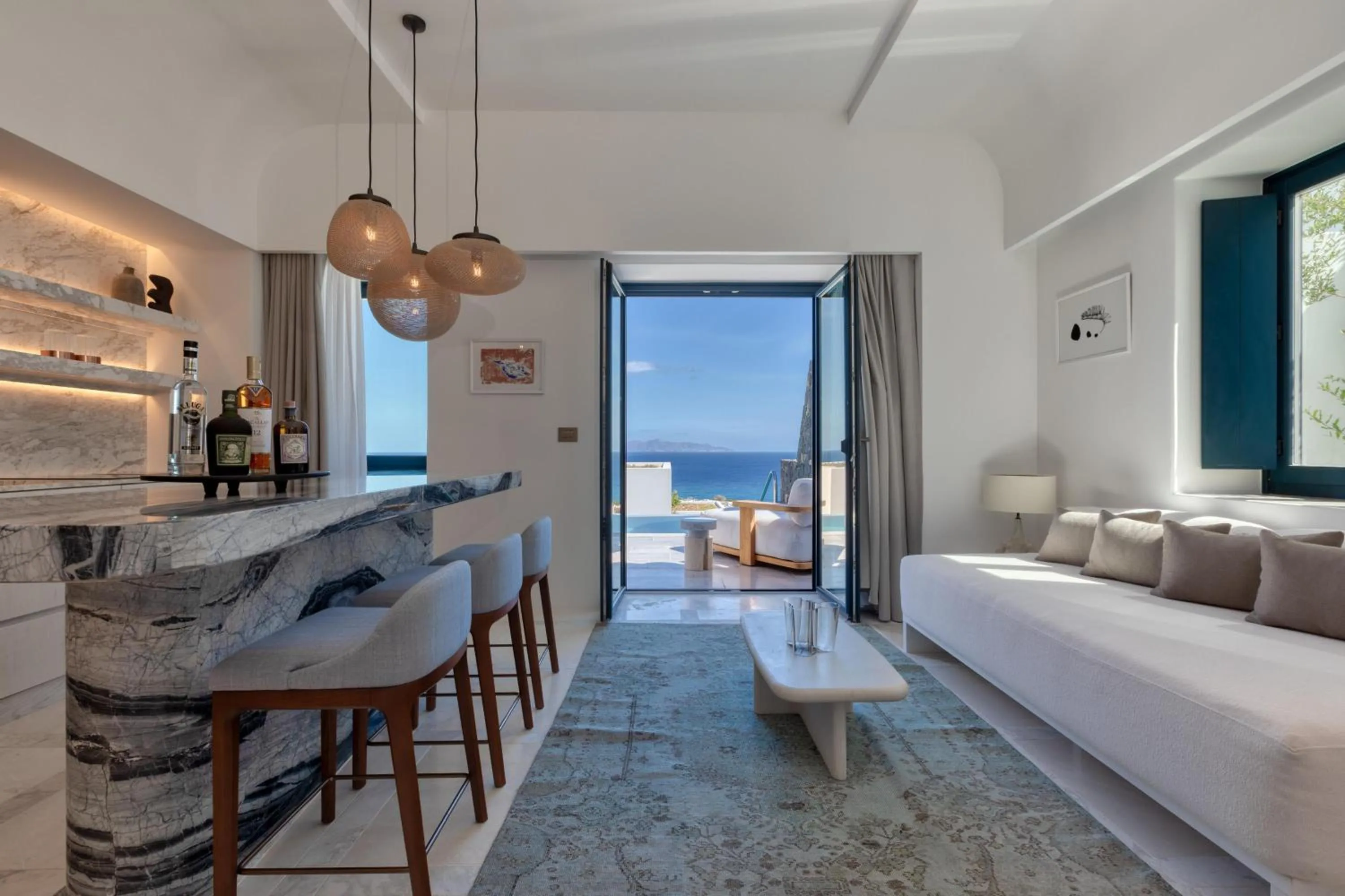 Living room, Bed in Sandblu Santorini, LXR Hotels & Resorts