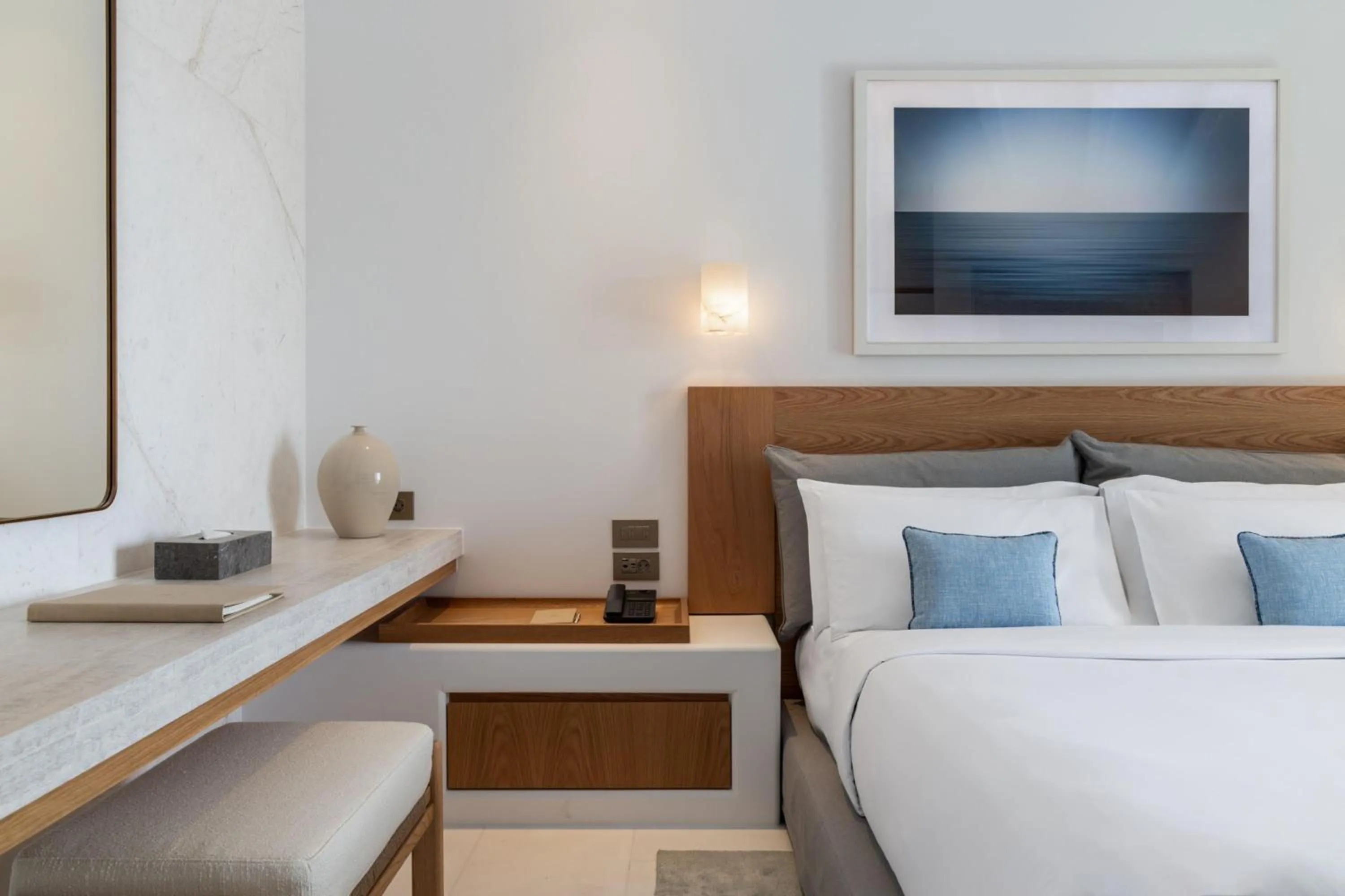 Bed in Sandblu Santorini, LXR Hotels & Resorts
