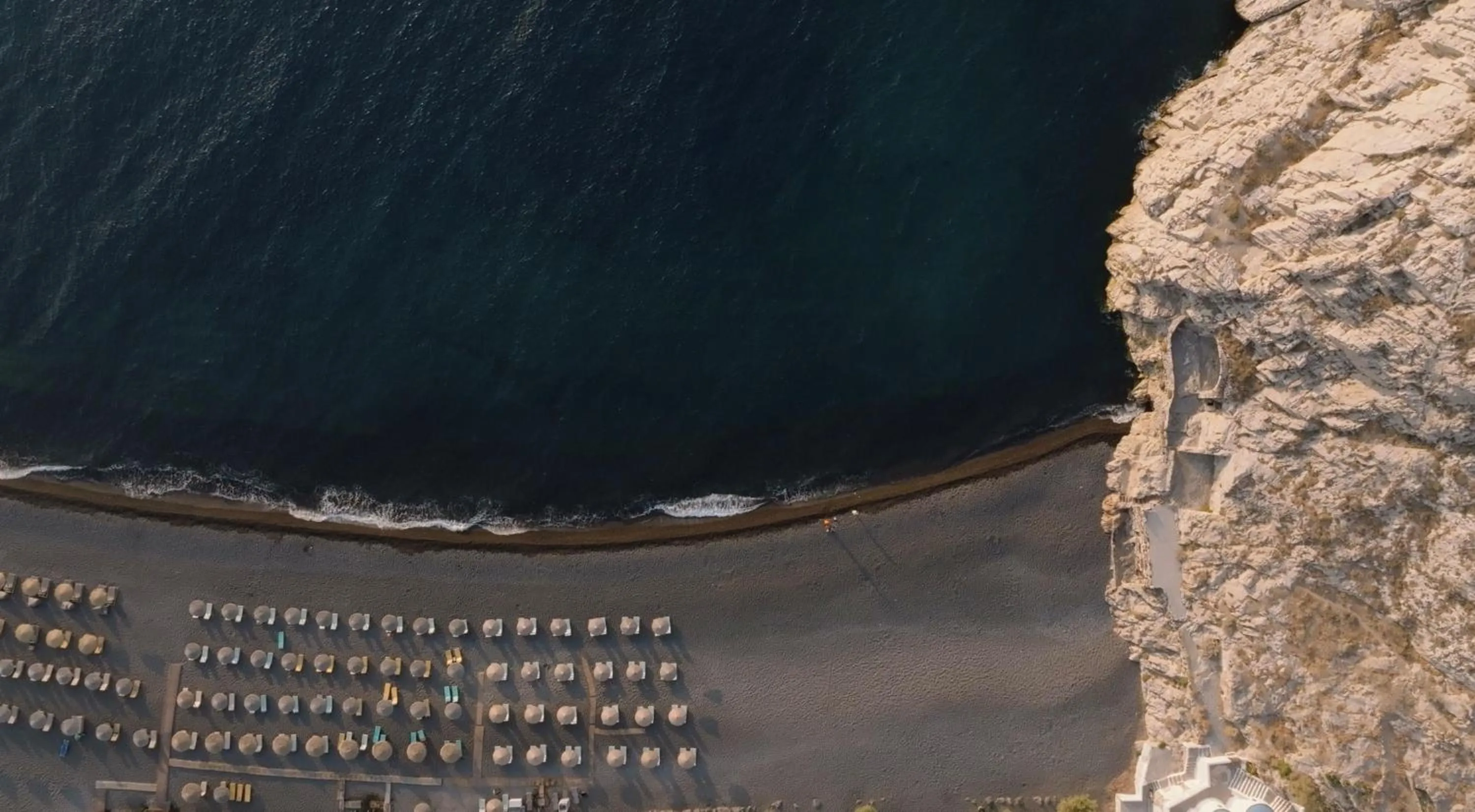 Beach in Sandblu Santorini, LXR Hotels & Resorts