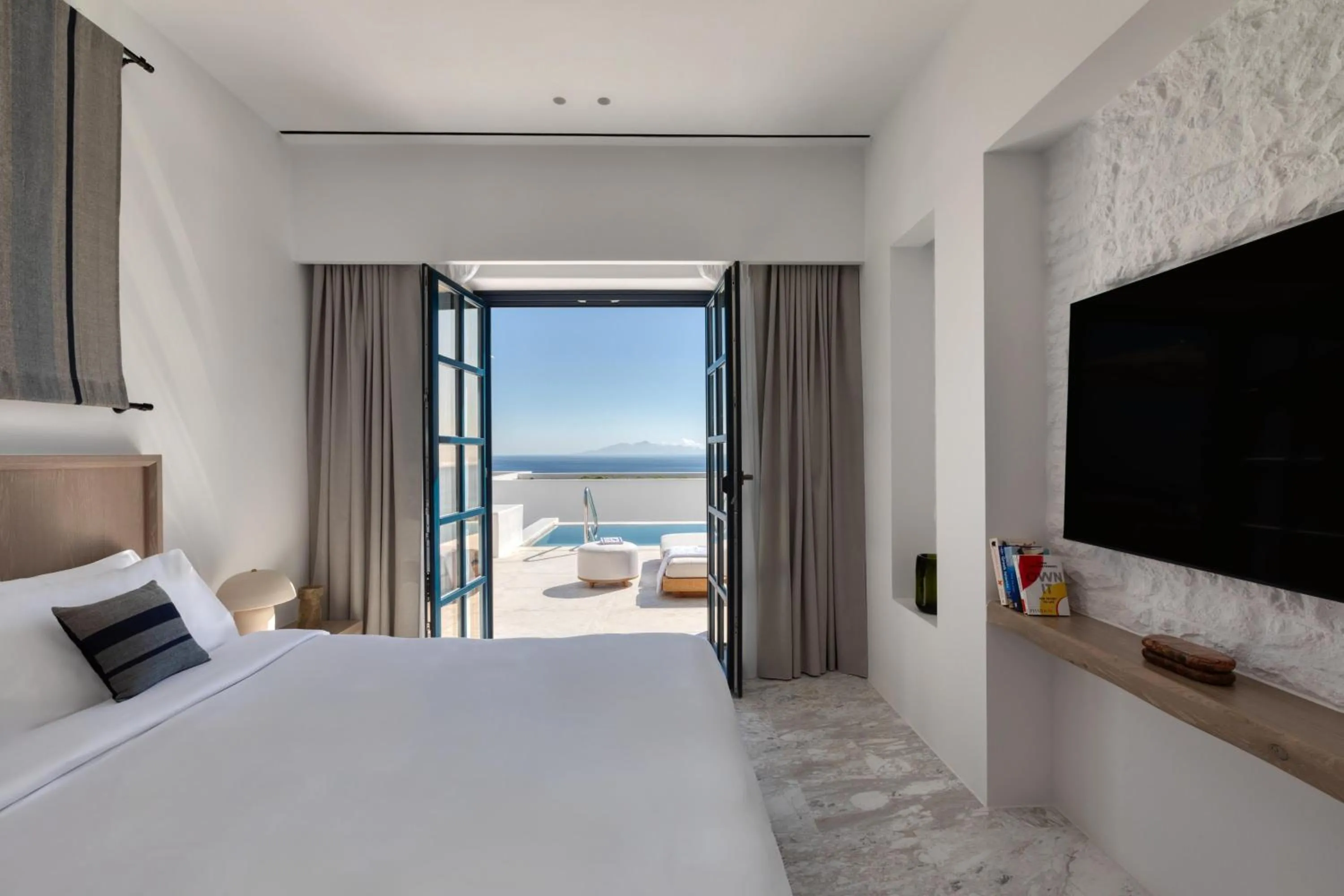 Bed in Sandblu Santorini, LXR Hotels & Resorts