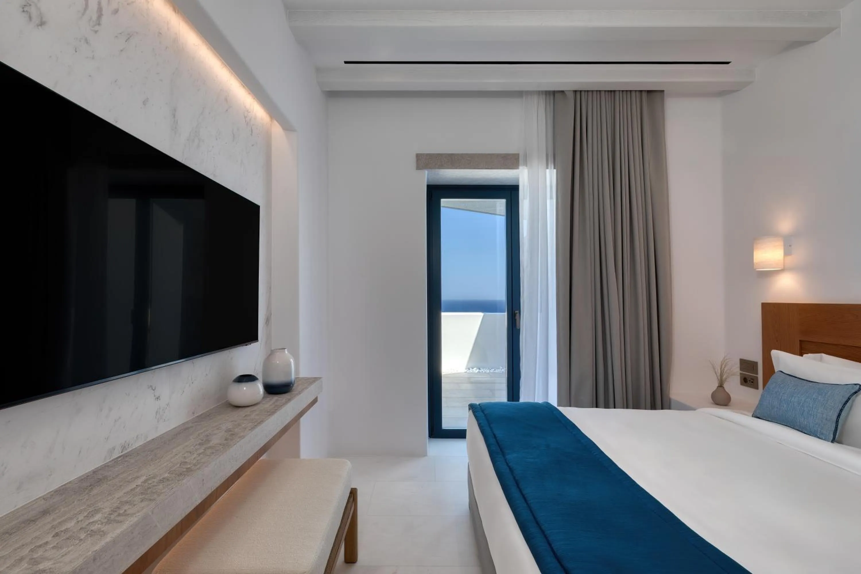 Bed in Sandblu Santorini, LXR Hotels & Resorts