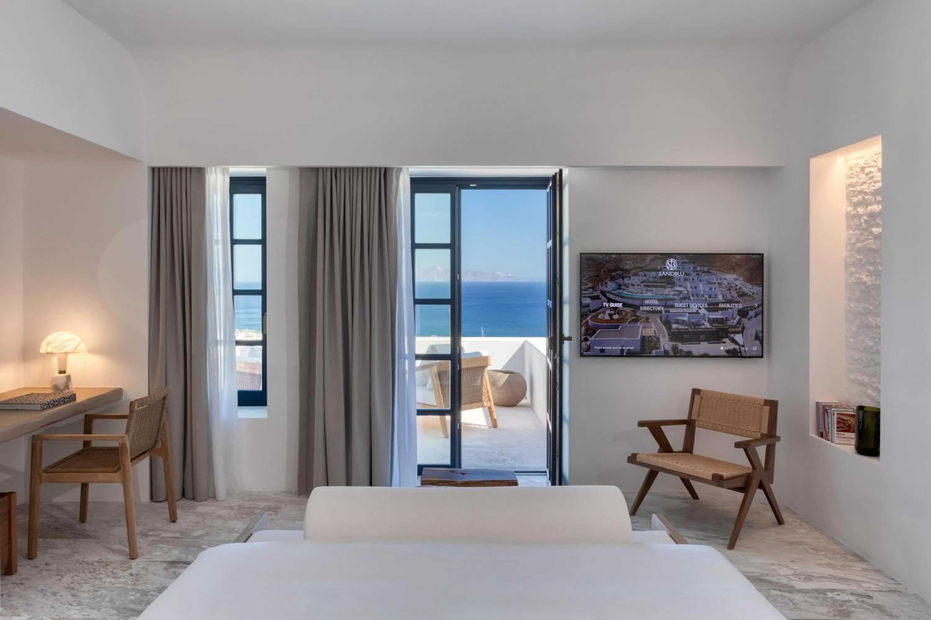 Bed in Sandblu Santorini, LXR Hotels & Resorts