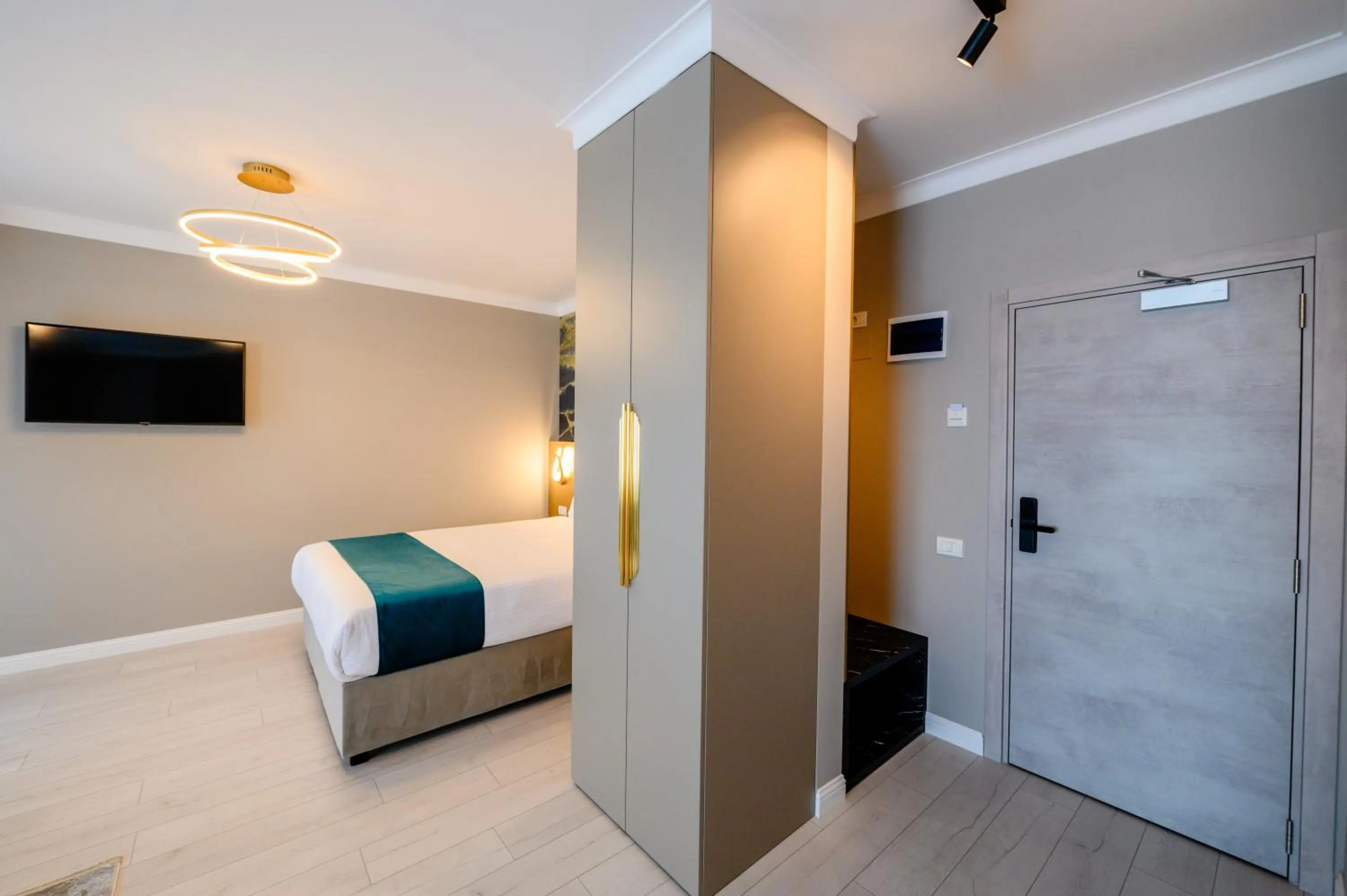 Bed in Elitte Inn & Suites