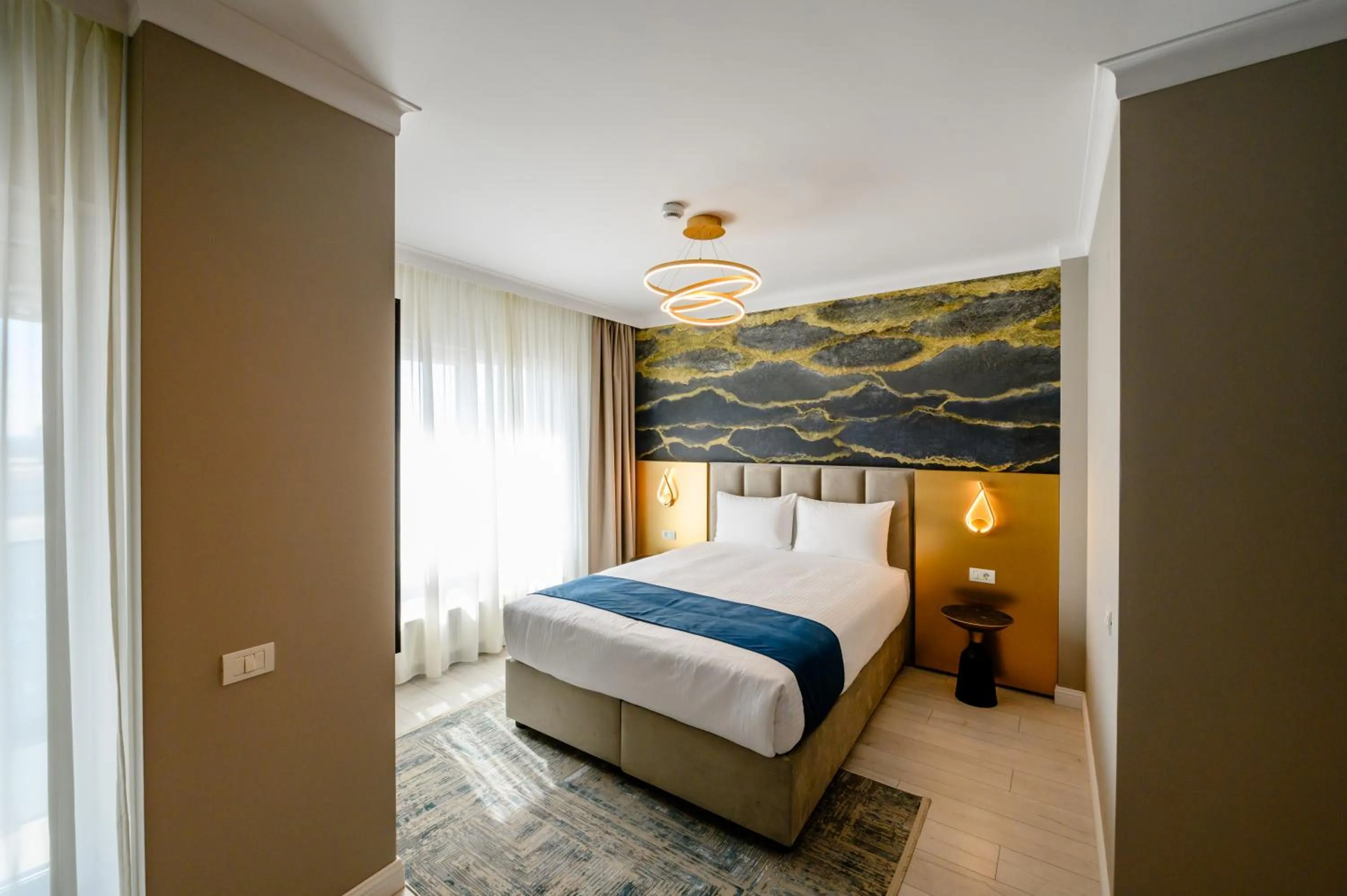 Bed in Elitte Inn & Suites