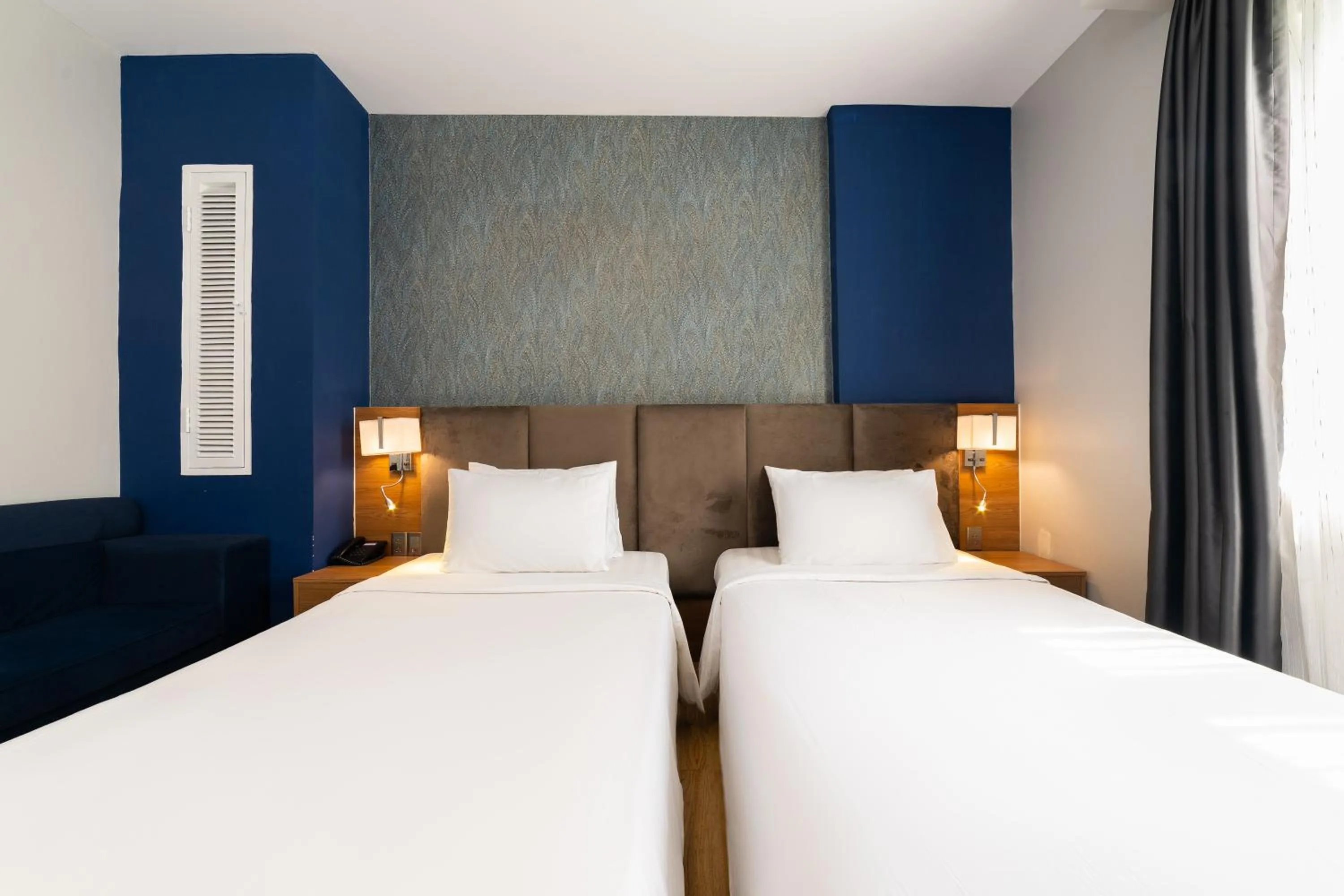 Bed in Nicecy NganHa Hotel