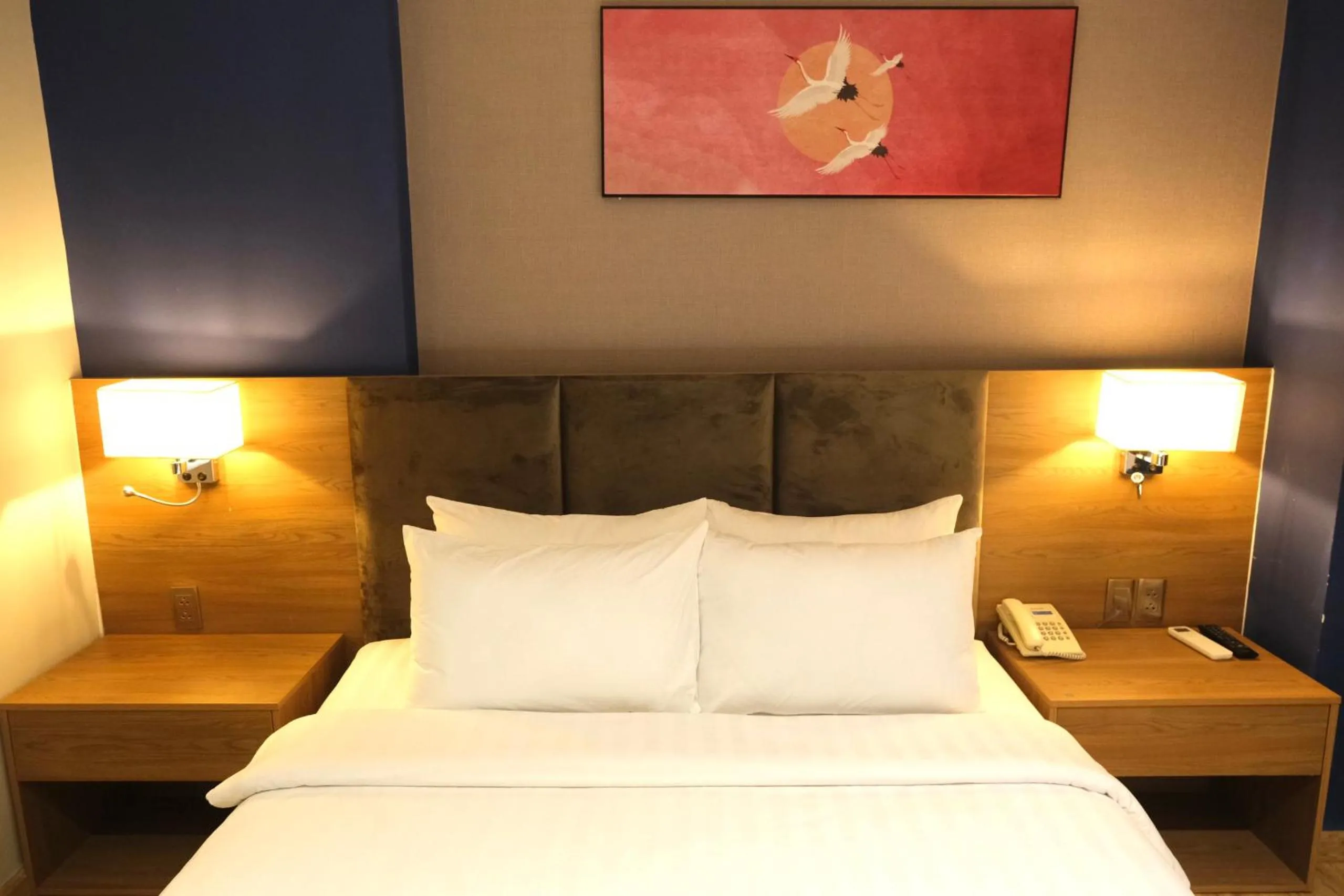 Bed in Nicecy NganHa Hotel