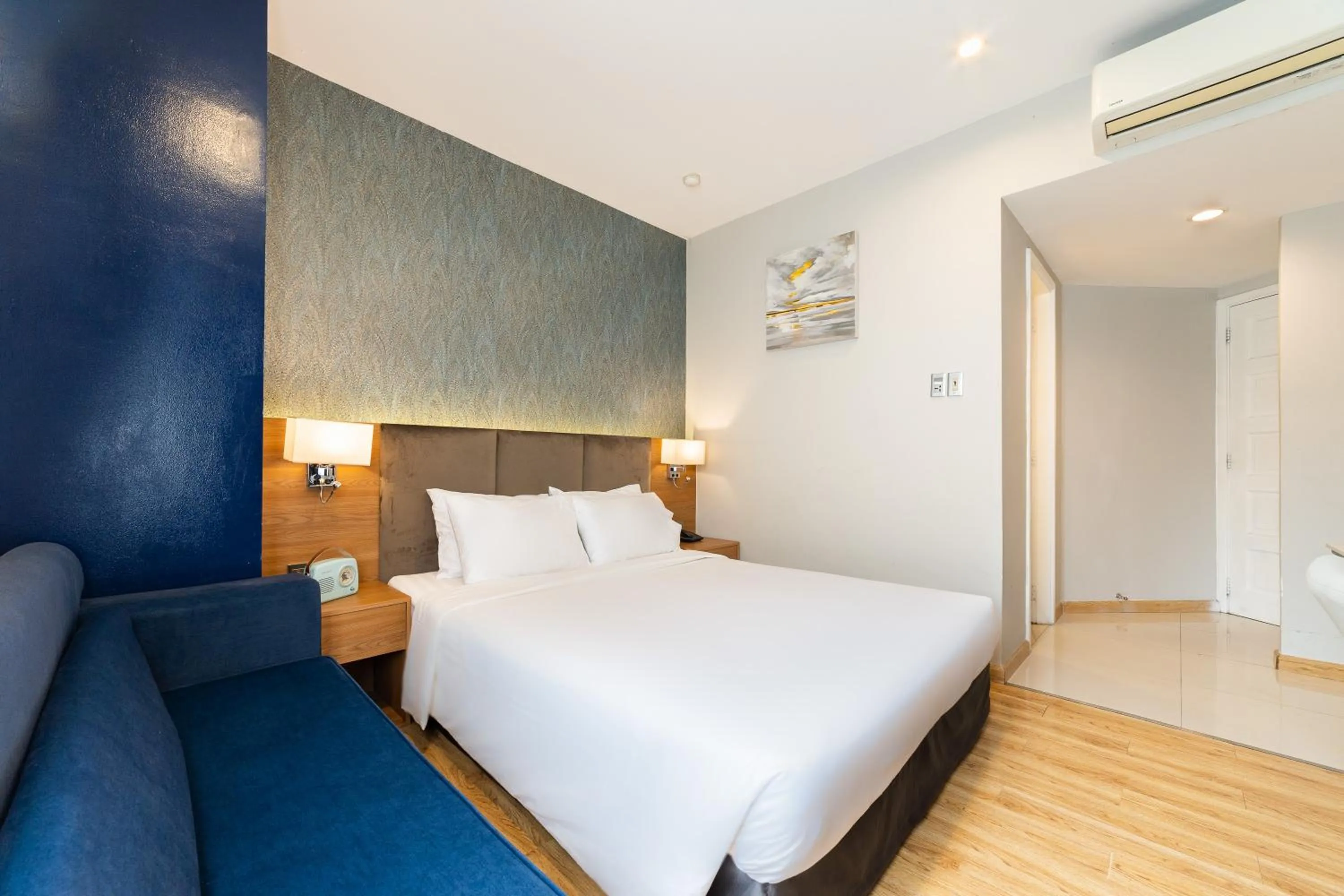 Bed in Nicecy NganHa Hotel