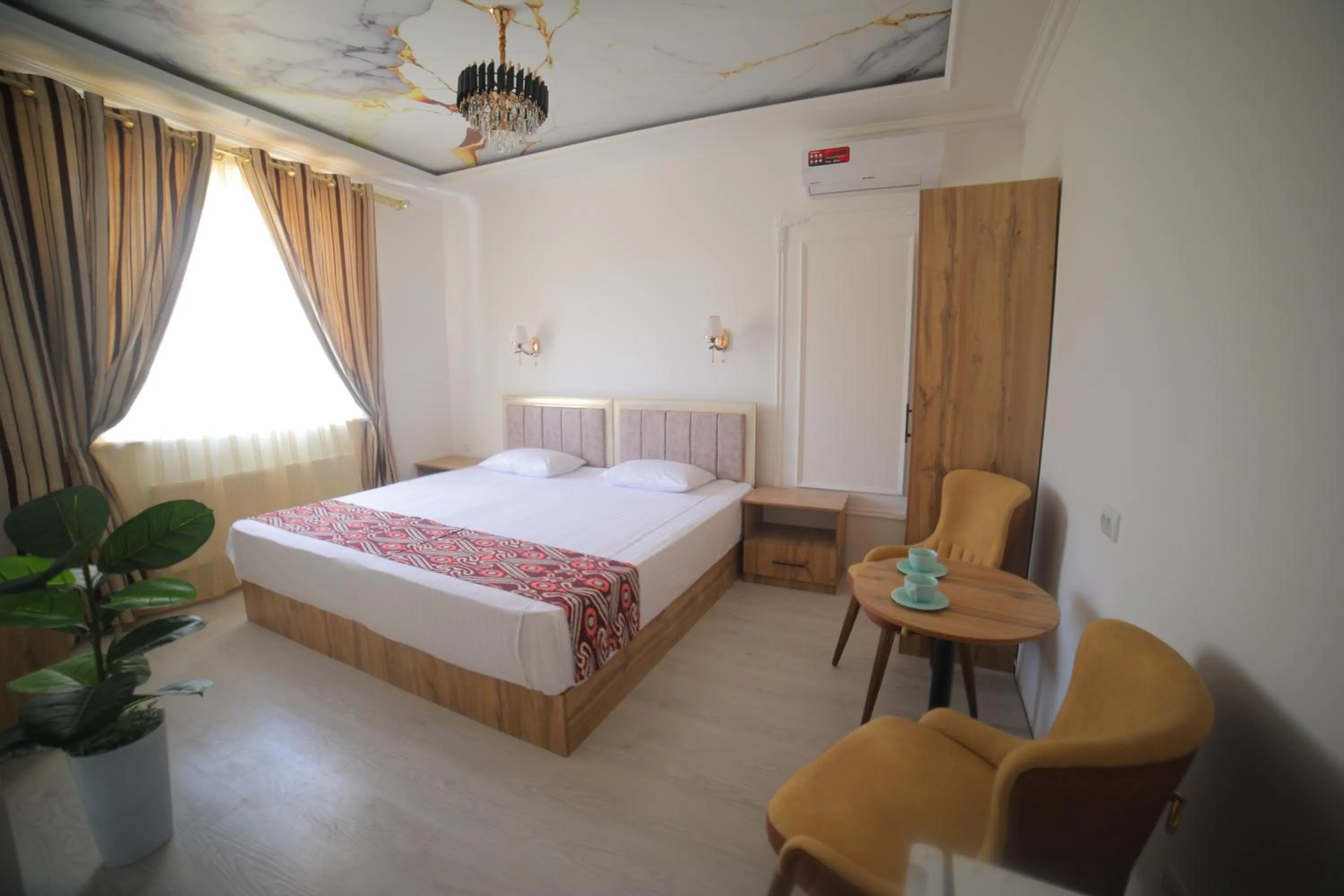 Photo of the whole room, Bed in Annex Hotel Khiva