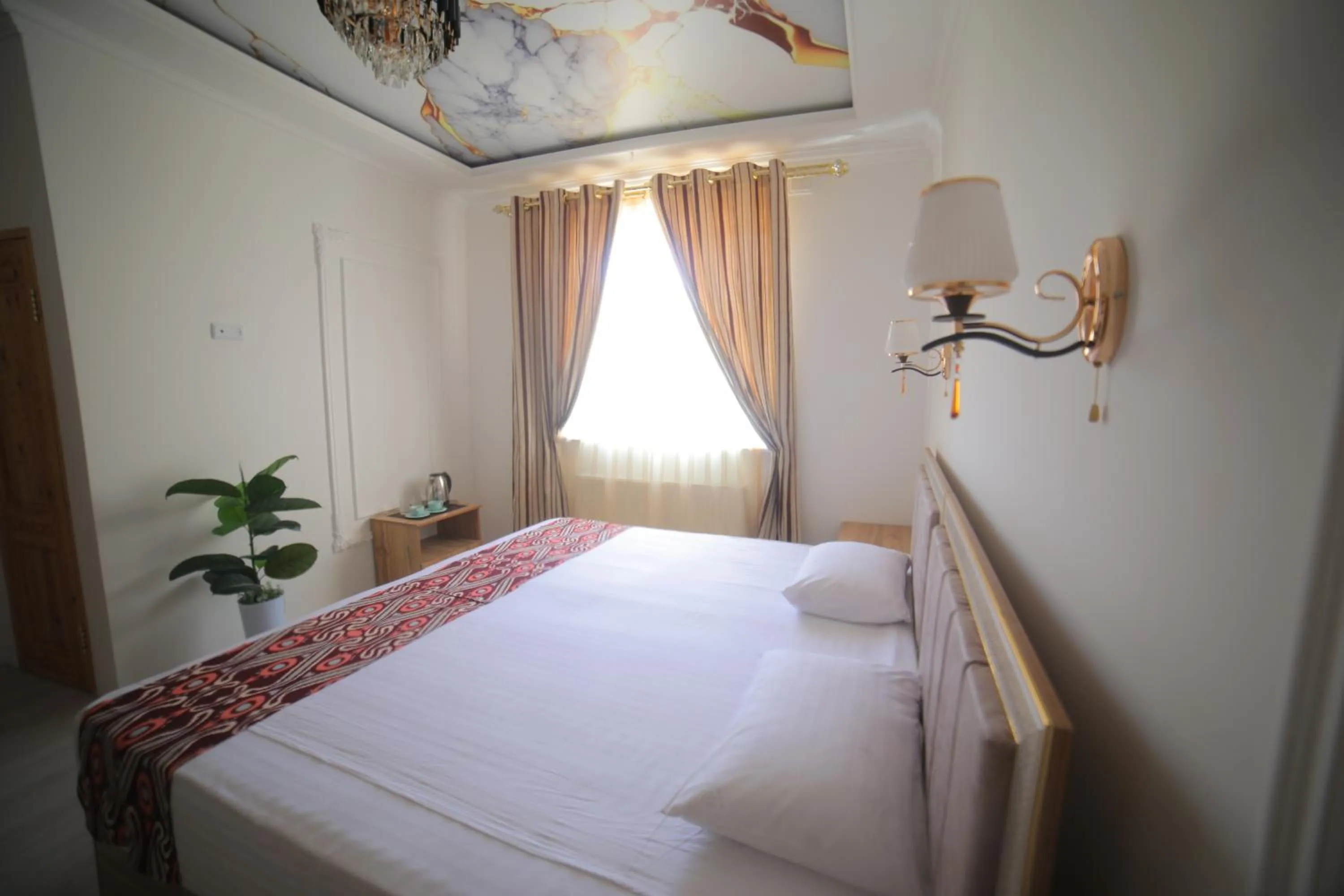 Bed in Annex Hotel Khiva