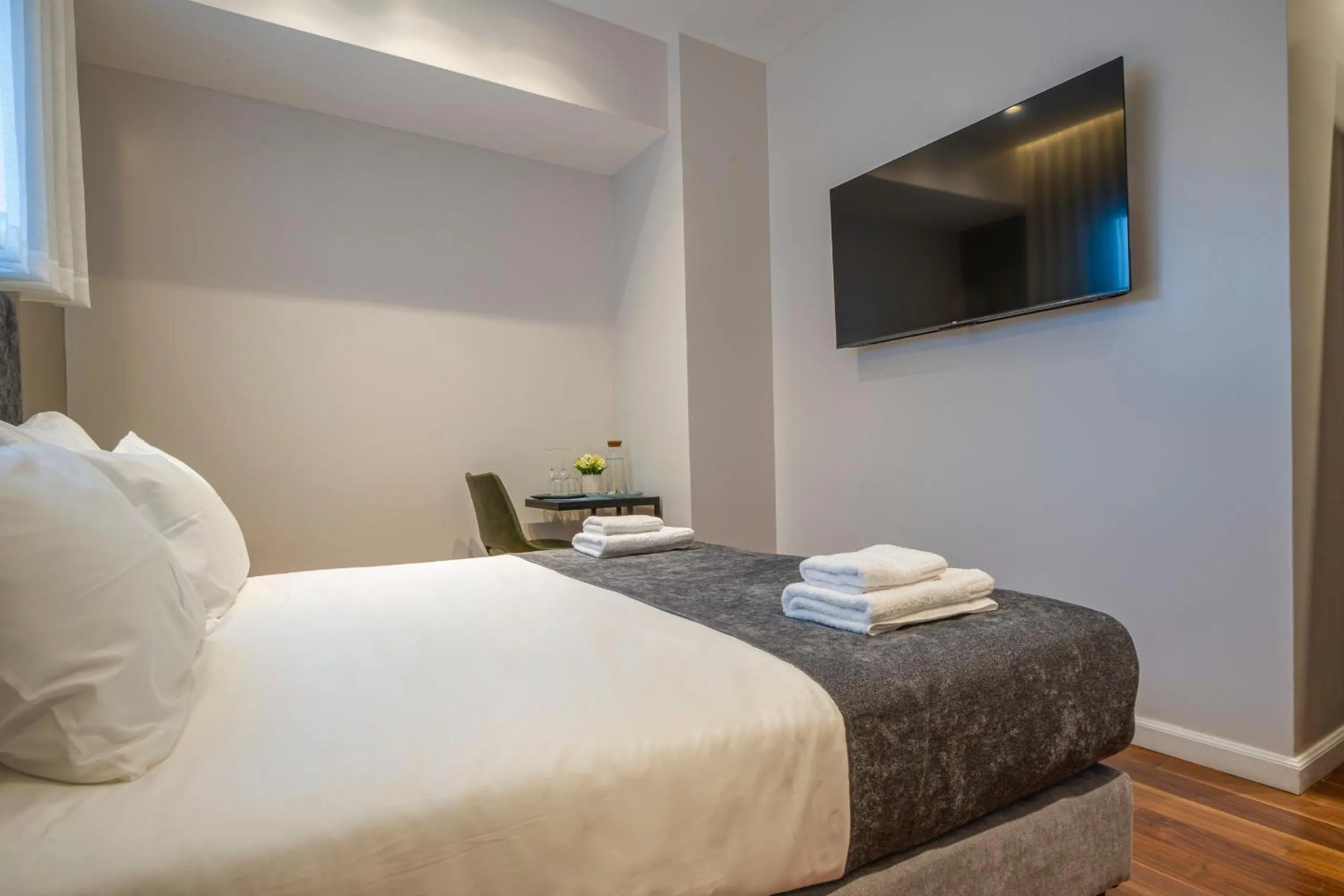 Bed in Hematian Hotel by Effy