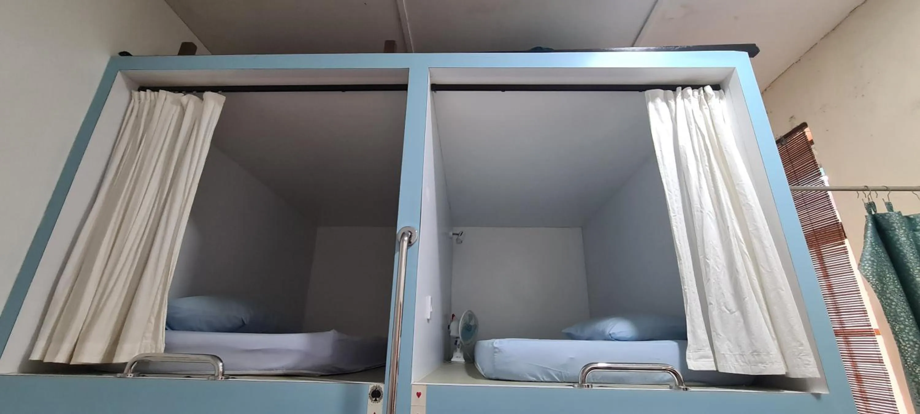 Bed in Sojourn Beds & Cafe