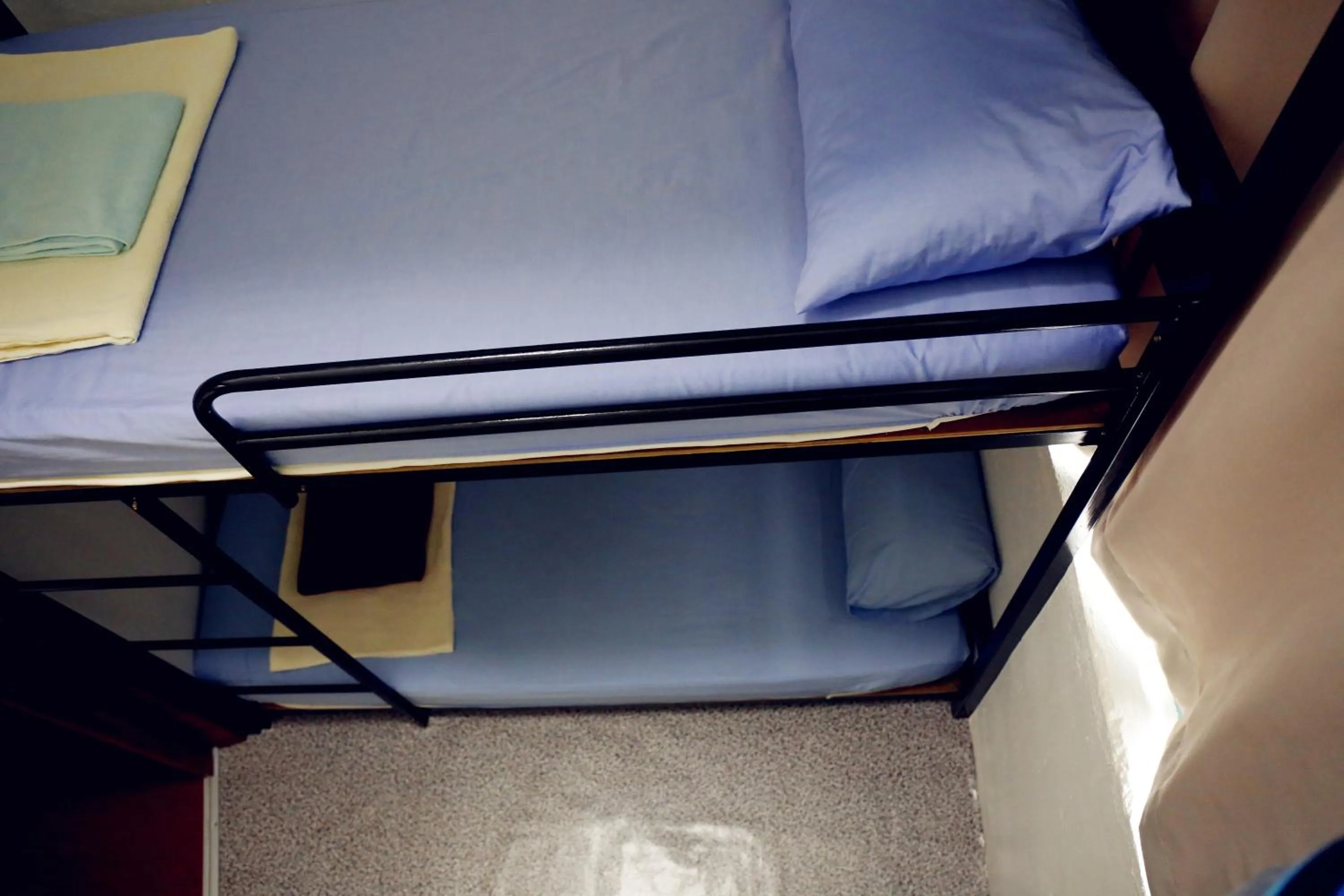 Bed in Sojourn Beds & Cafe